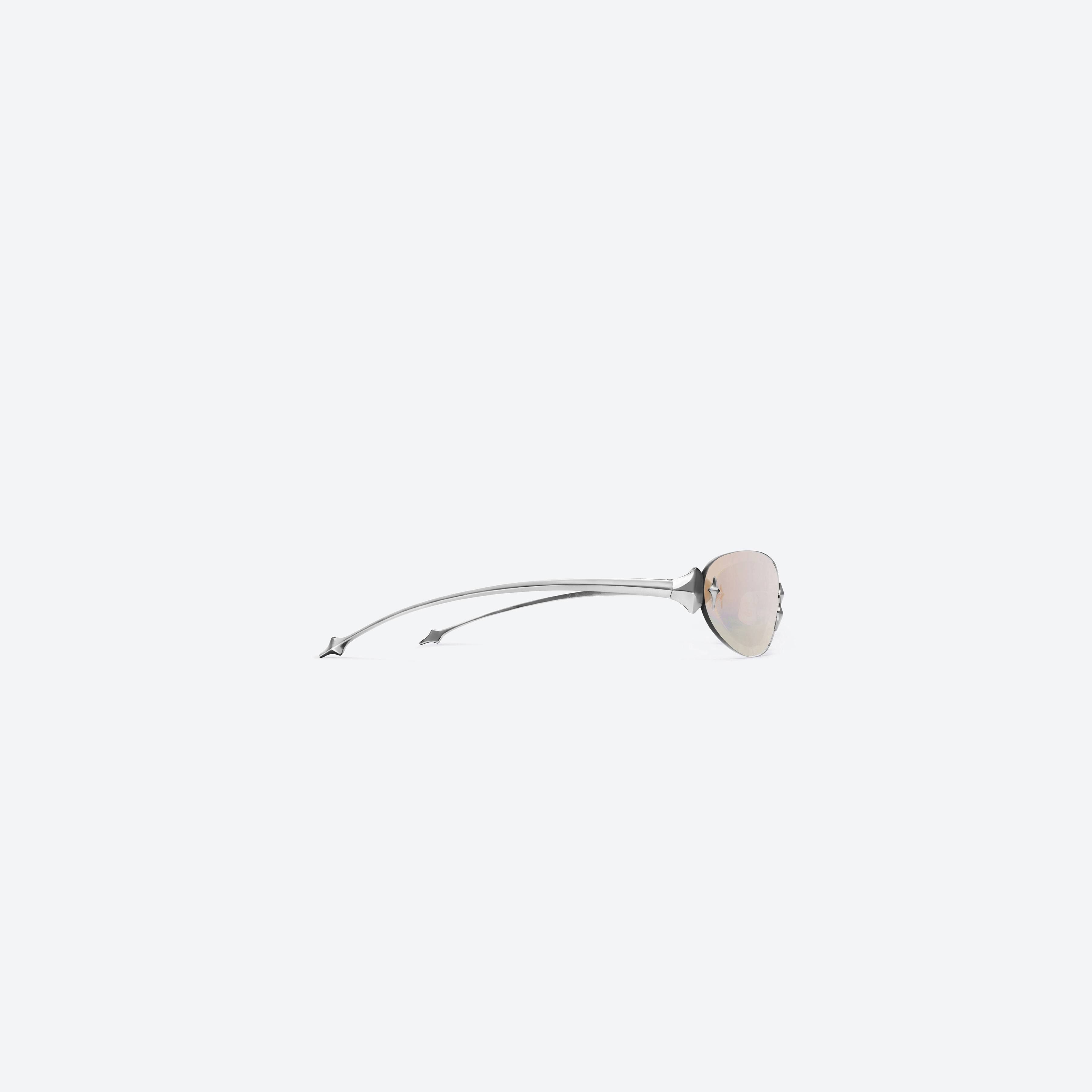 A detailed right view of Gentle Monster Tta 02 Silver Metal framed Oval sunglasses.