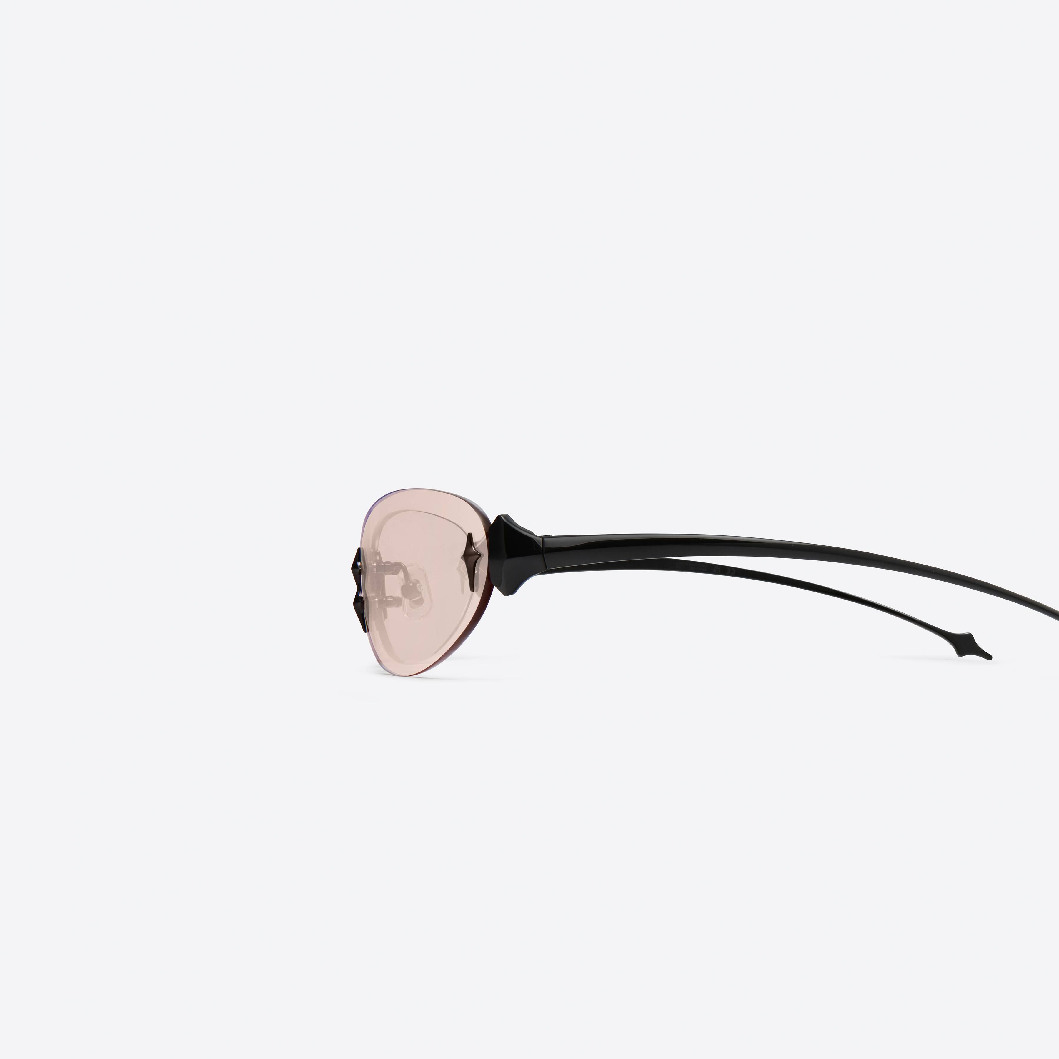 A detailed left view of Gentle Monster Tta 01 Black Metal framed Oval sunglasses.