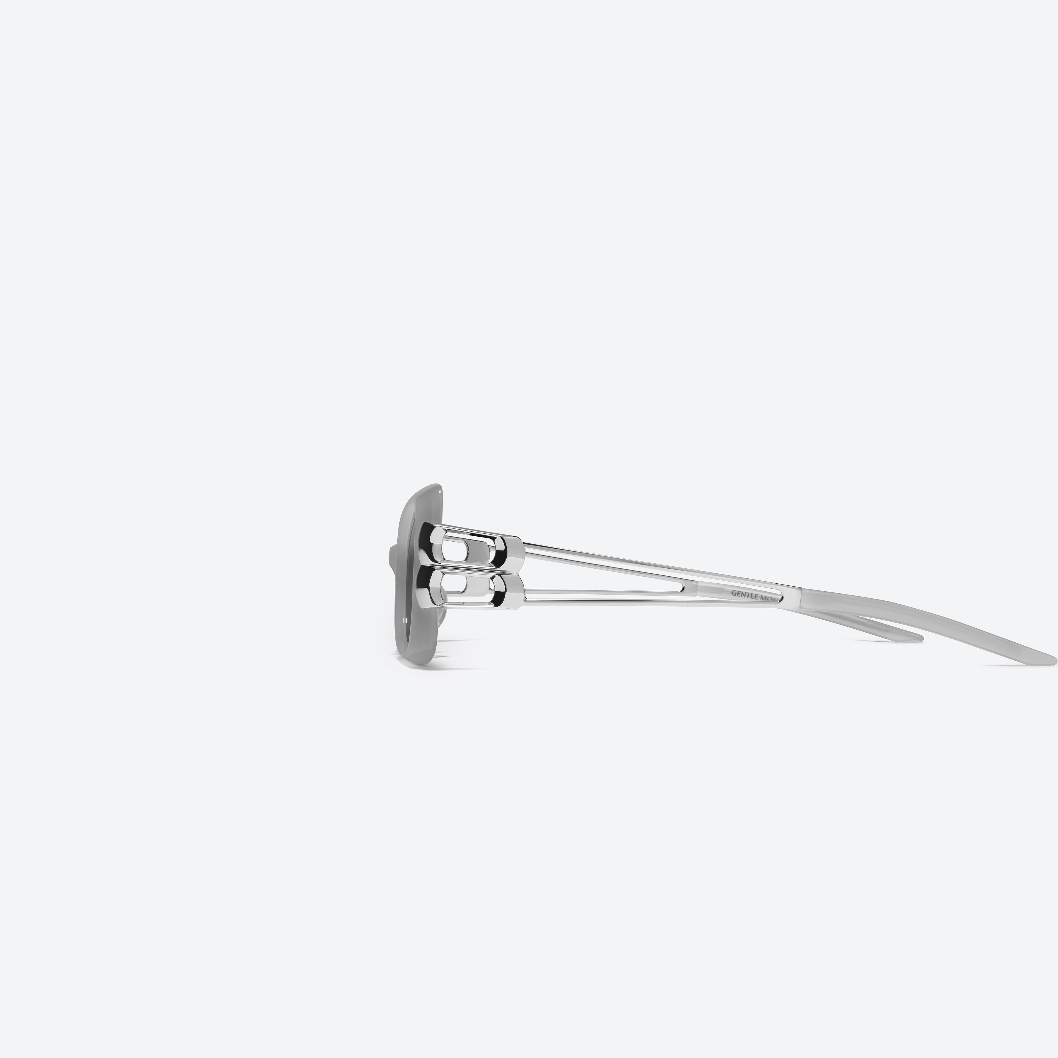 A detailed left view of Gentle Monster Nemesis GC11 Gray Mixed framed Cat-eye sunglasses.
