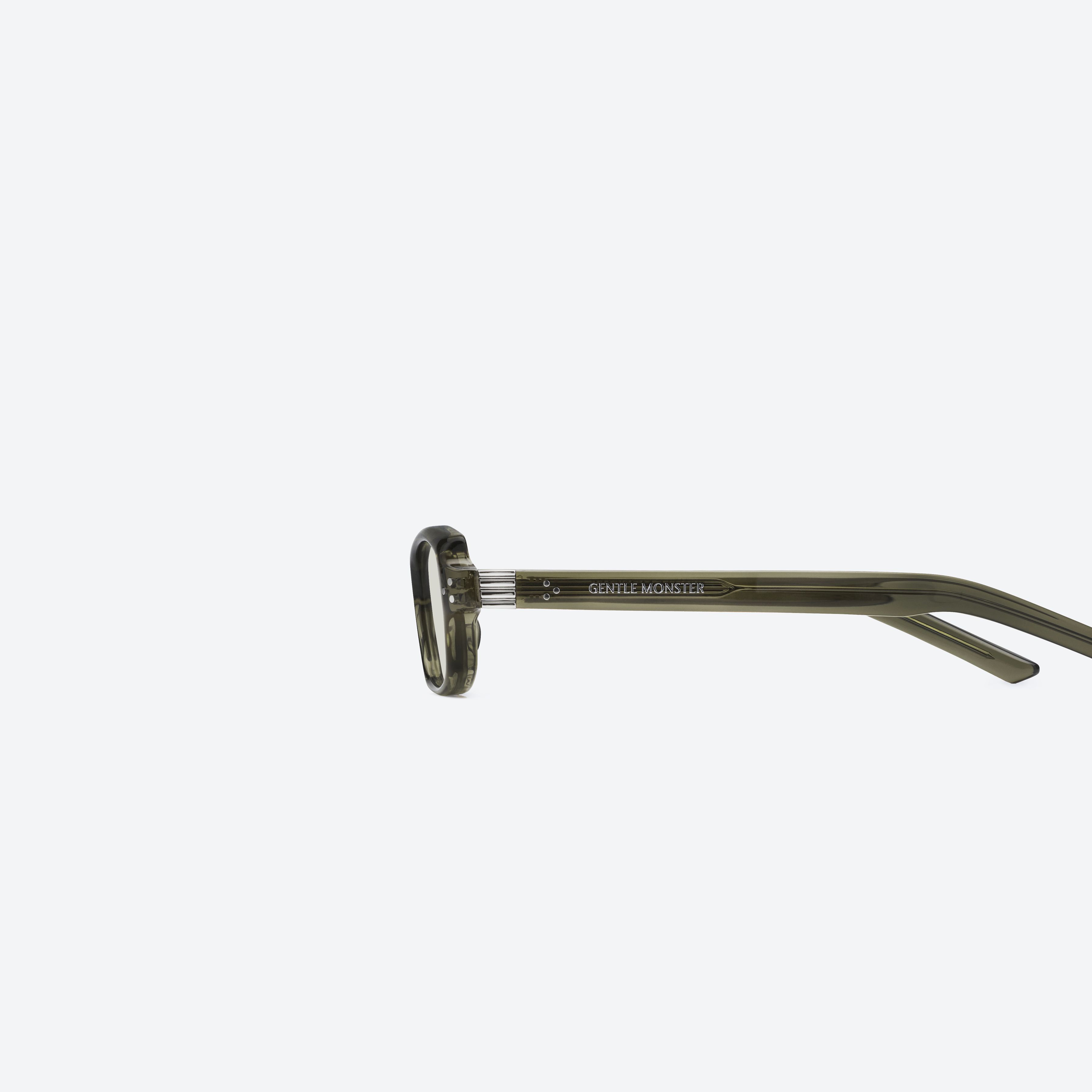 A detailed left view of Gentle Monster SLYK KC1 Green Acetate framed Square glasses.