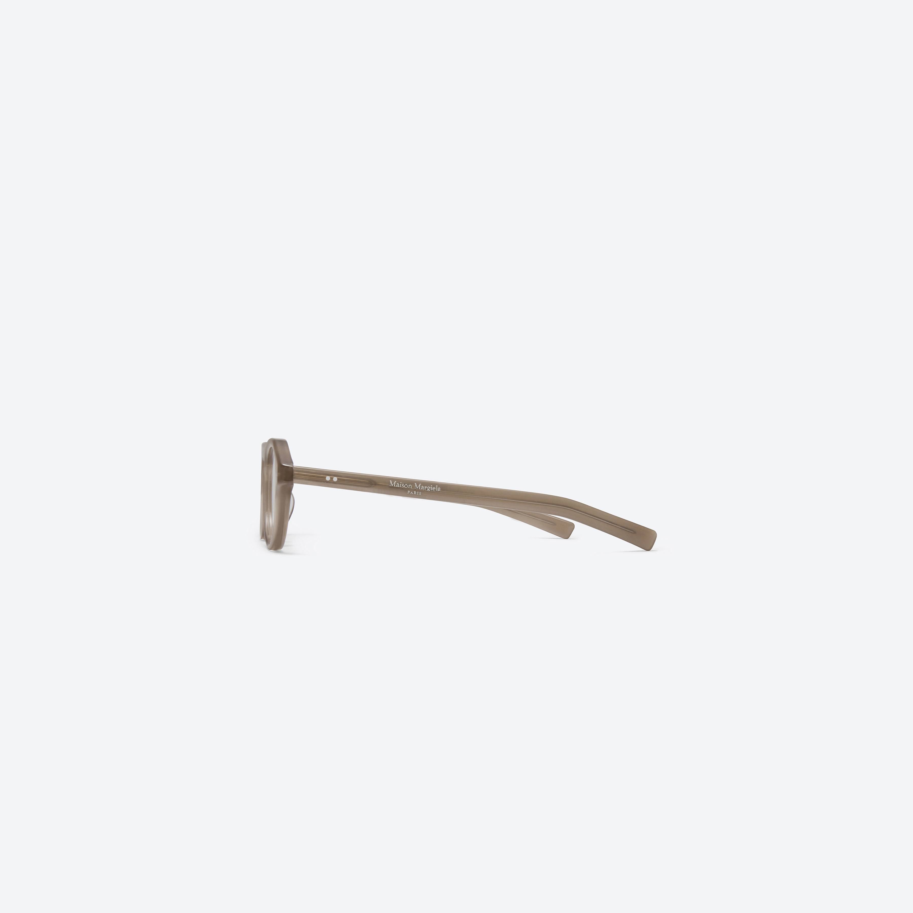 A detailed right view of Gentle Monster Maison Margiela - MM112 BRC9 Brown Acetate framed Aviator glasses.