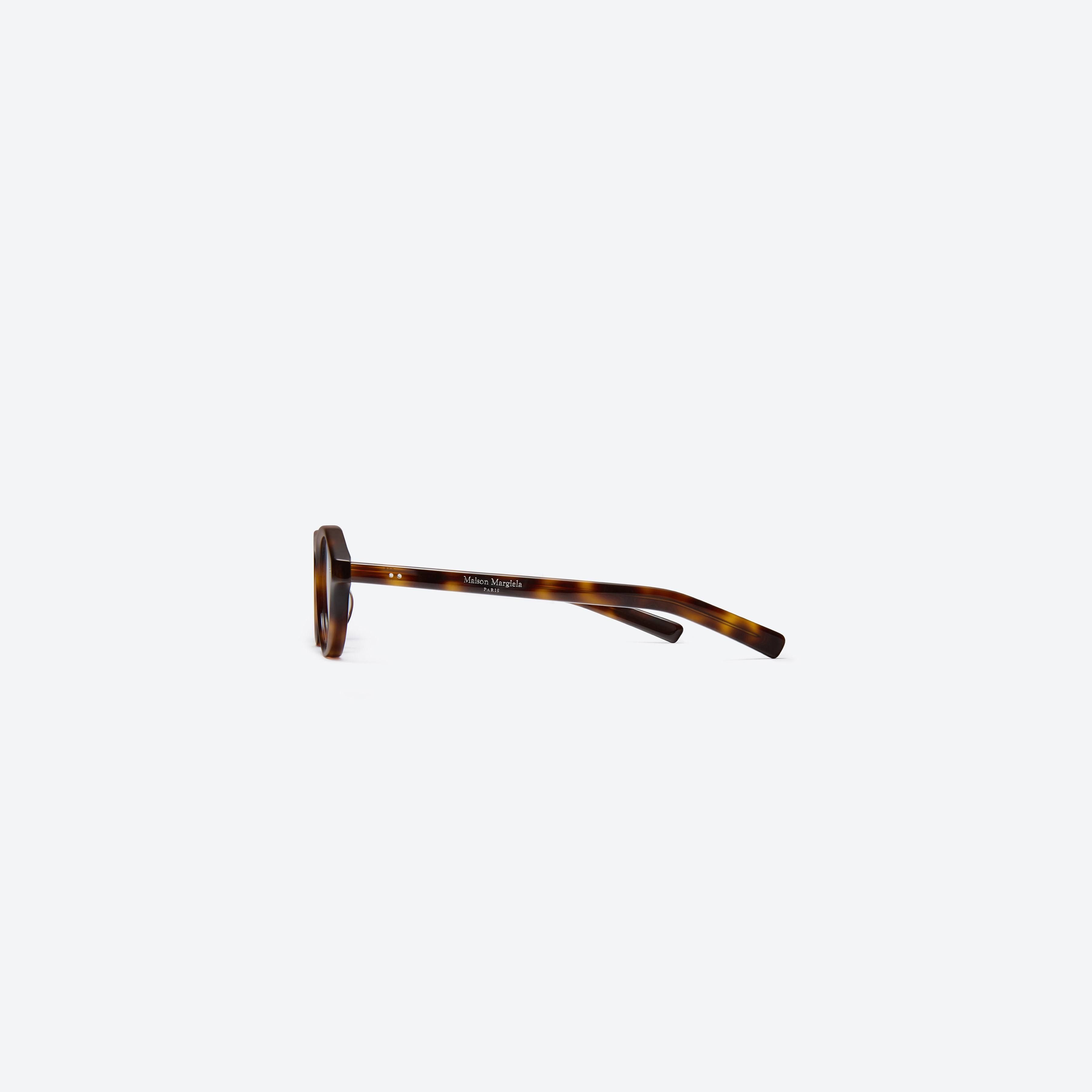 A detailed right view of Gentle Monster Maison Margiela - MM112 L2 Tortoise Acetate framed Aviator glasses.