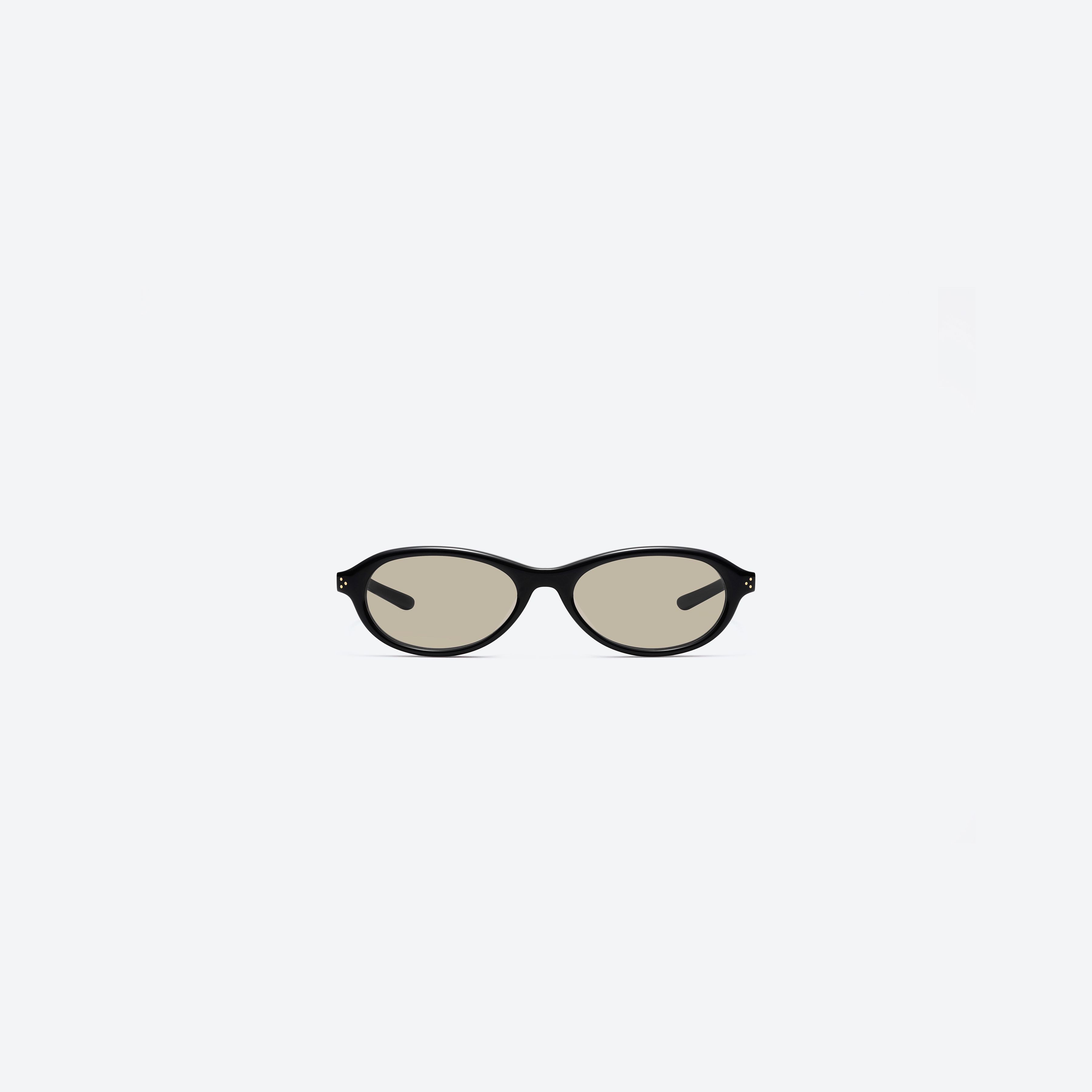 A detailed right view of Gentle Monster Be Slo 01(Light-Adaptive) Black Acetate framed Aviator glasses.