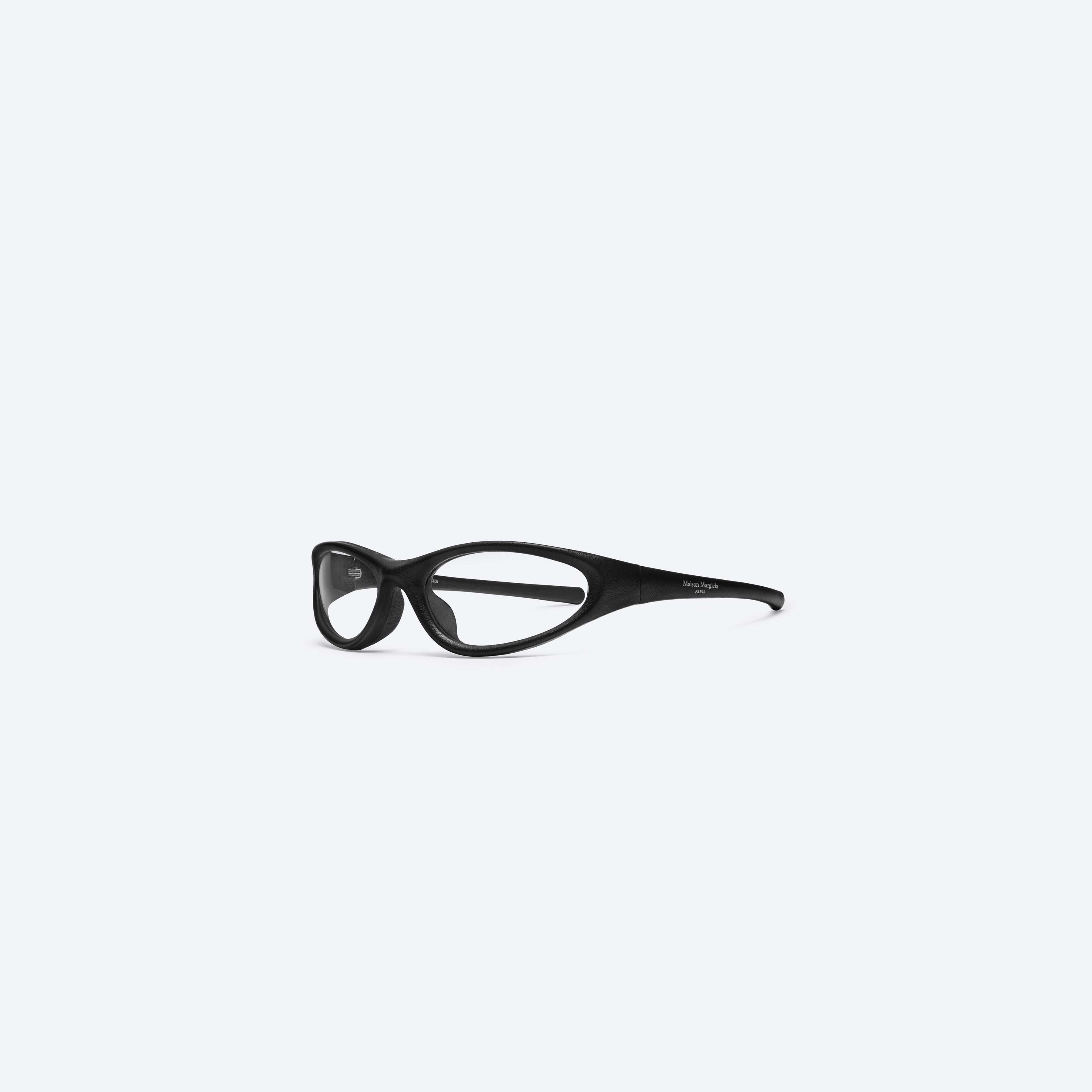 45-degree view of Gentle Monster Maison Margiela - MM115 Leather L01 Black Acetate framed Wraparound glasses.