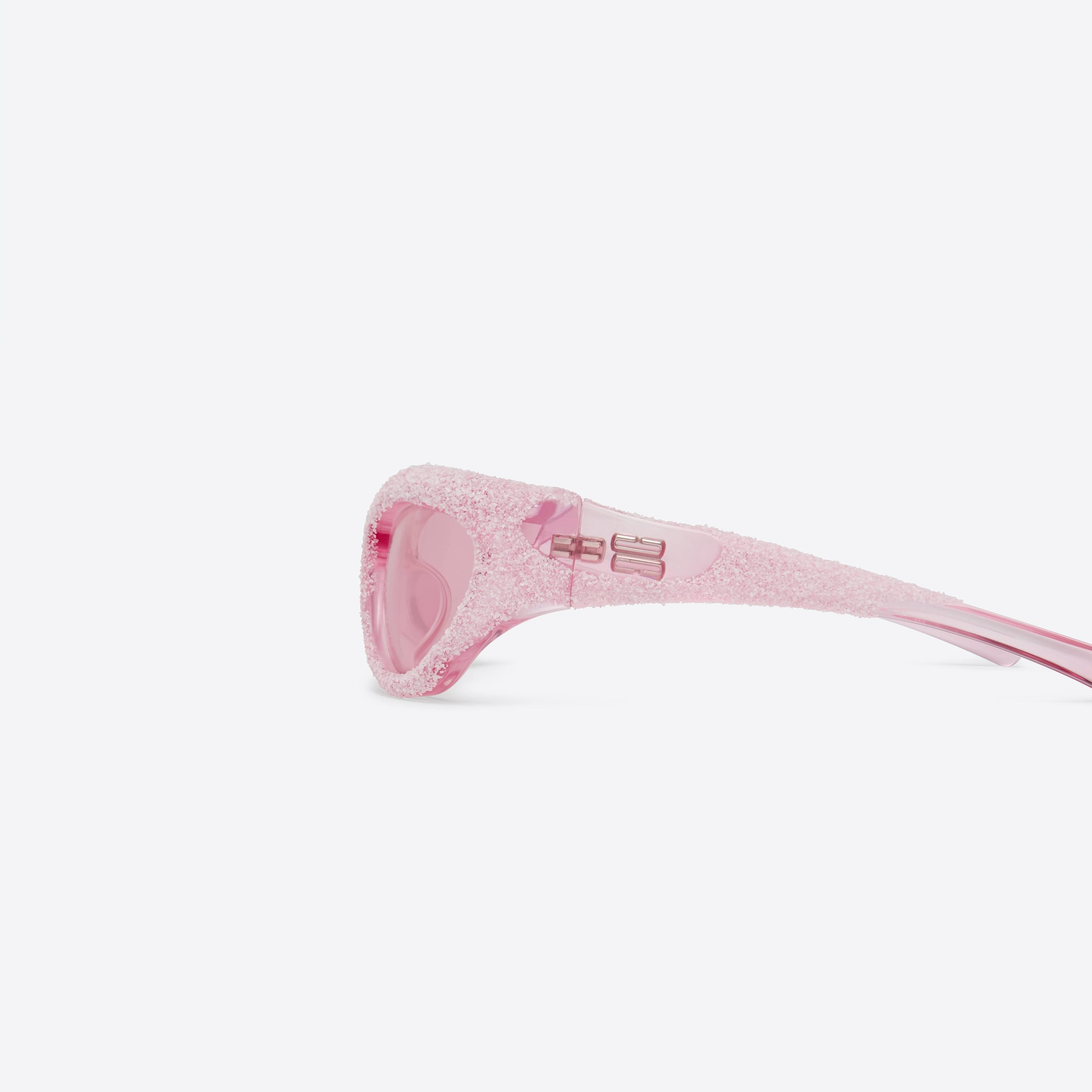 A detailed left view of Gentle Monster Yummy PC11 Pink Nylon framed Wraparound sunglasses.