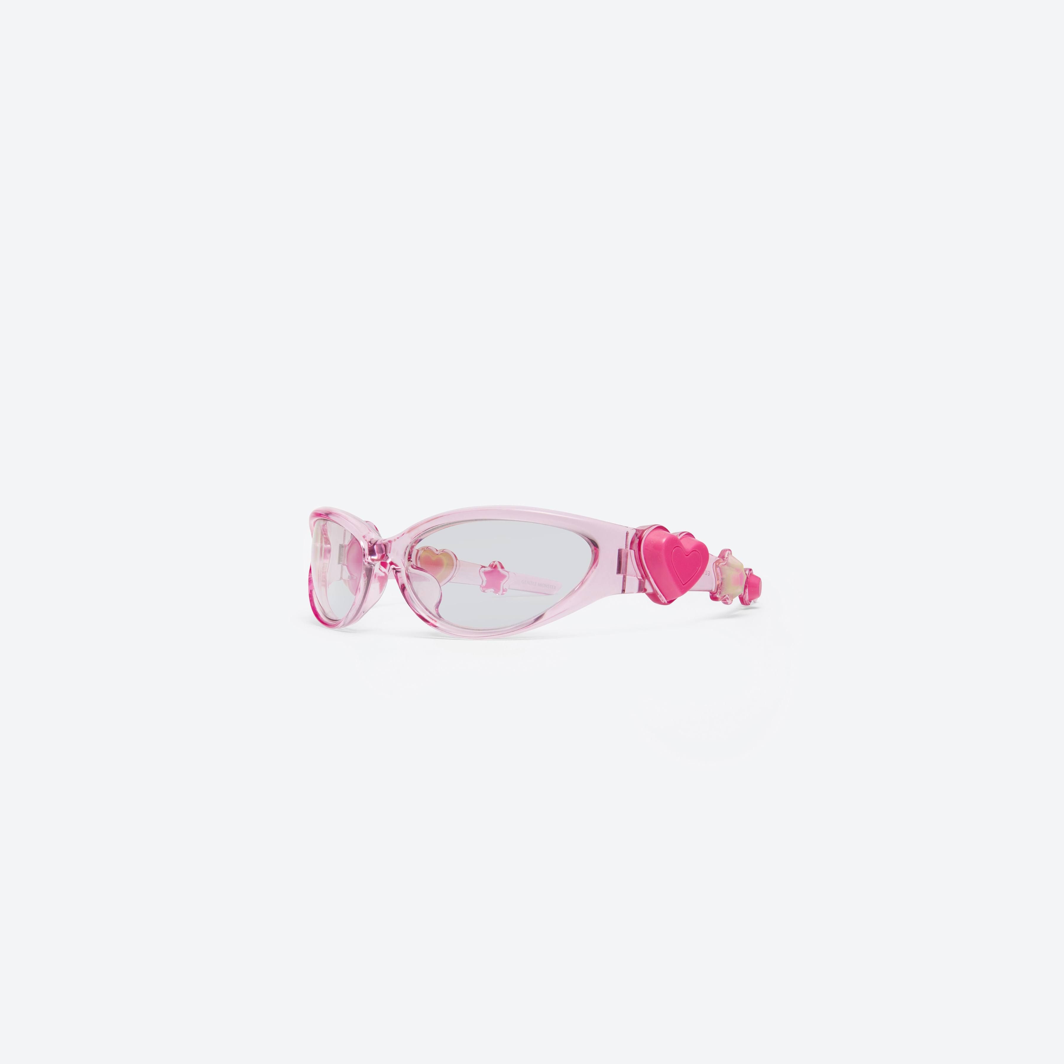 45-degree view of Gentle Monster Gummy PC12 Pink Nylon framed Wraparound sunglasses.