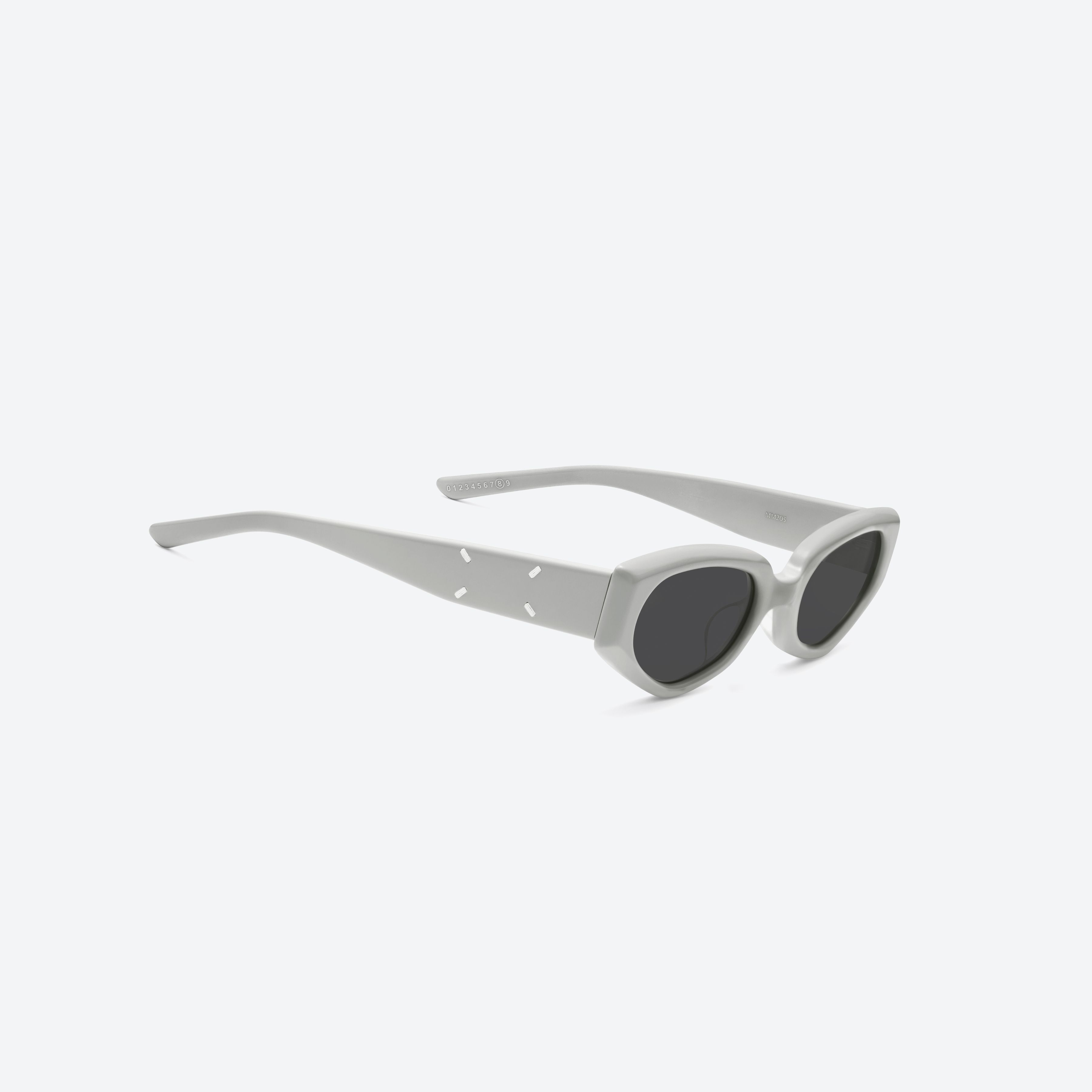 45-degree detailed view of Gentle Monster Maison Margiela - MM205 G12 Gray Acetate framed Cat-eye sunglasses.