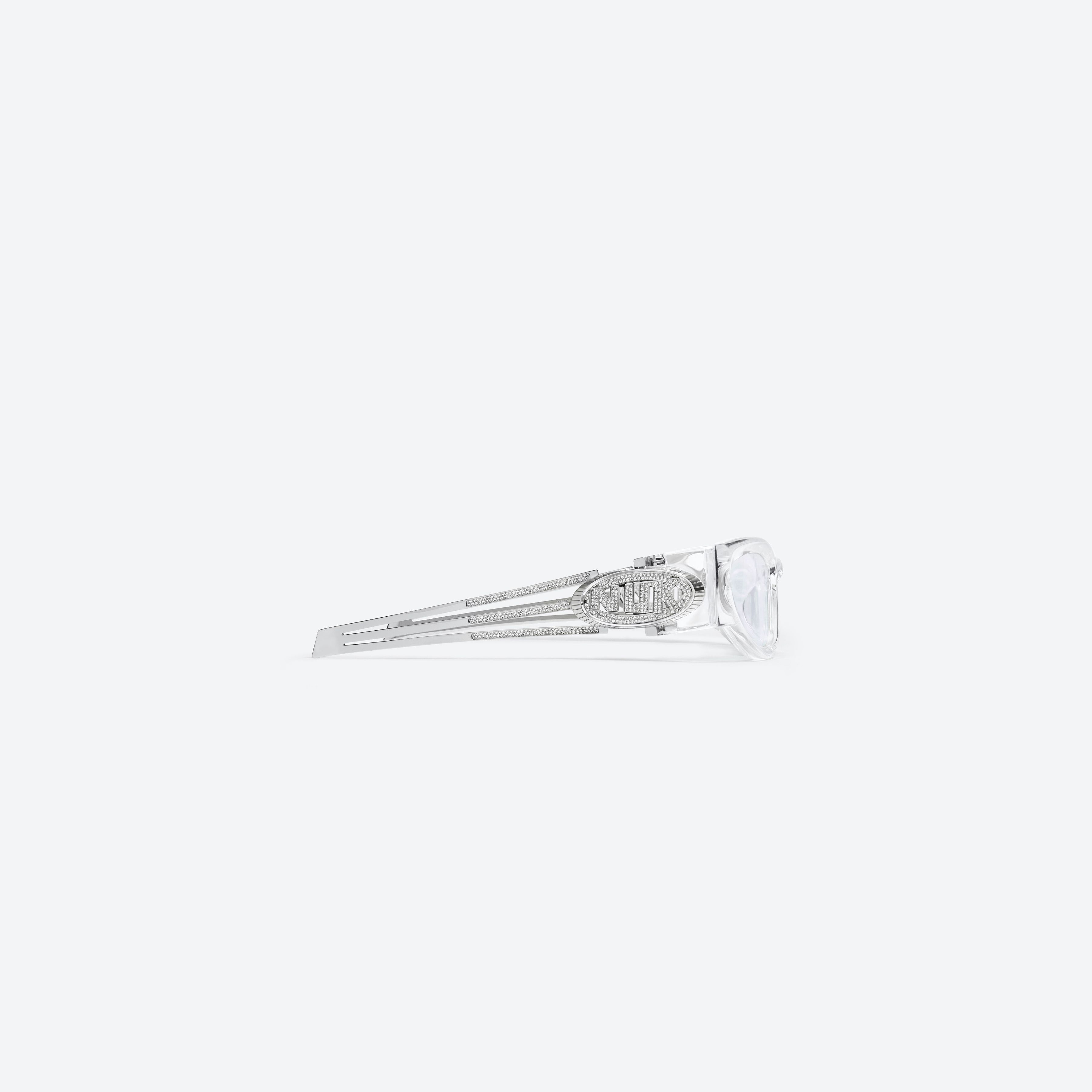 A detailed right view of Gentle Monster KUN - 0001 C1 Clear Mixed framed Wraparound sunglasses.