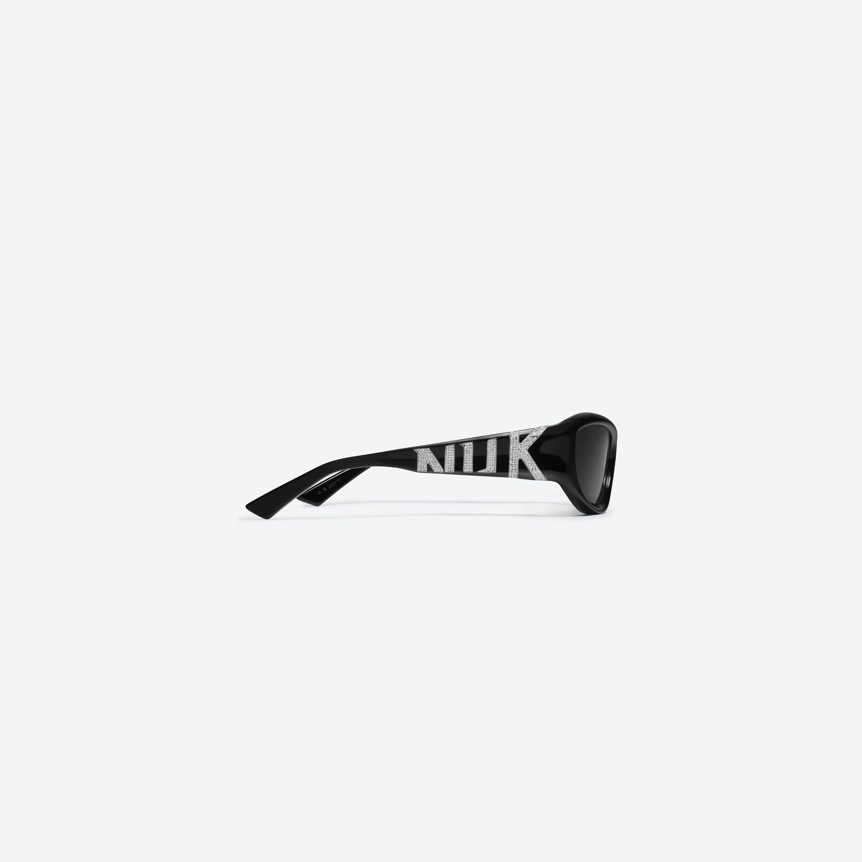 A detailed right view of Gentle Monster KUN - 0002 01 Black Mixed framed Wraparound sunglasses.