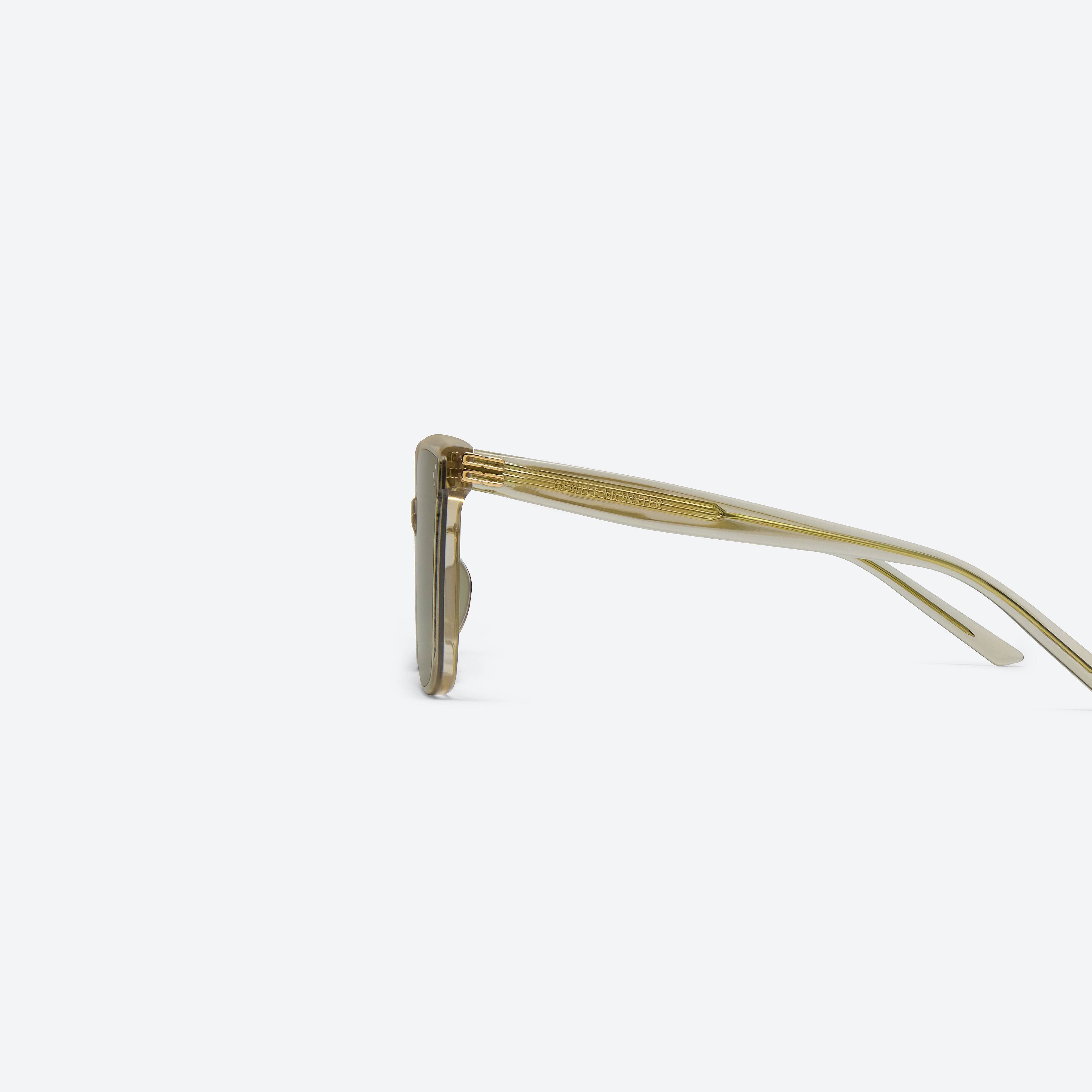 A detailed left view of Gentle Monster Piana BRC18 Brown Acetate framed Square sunglasses.