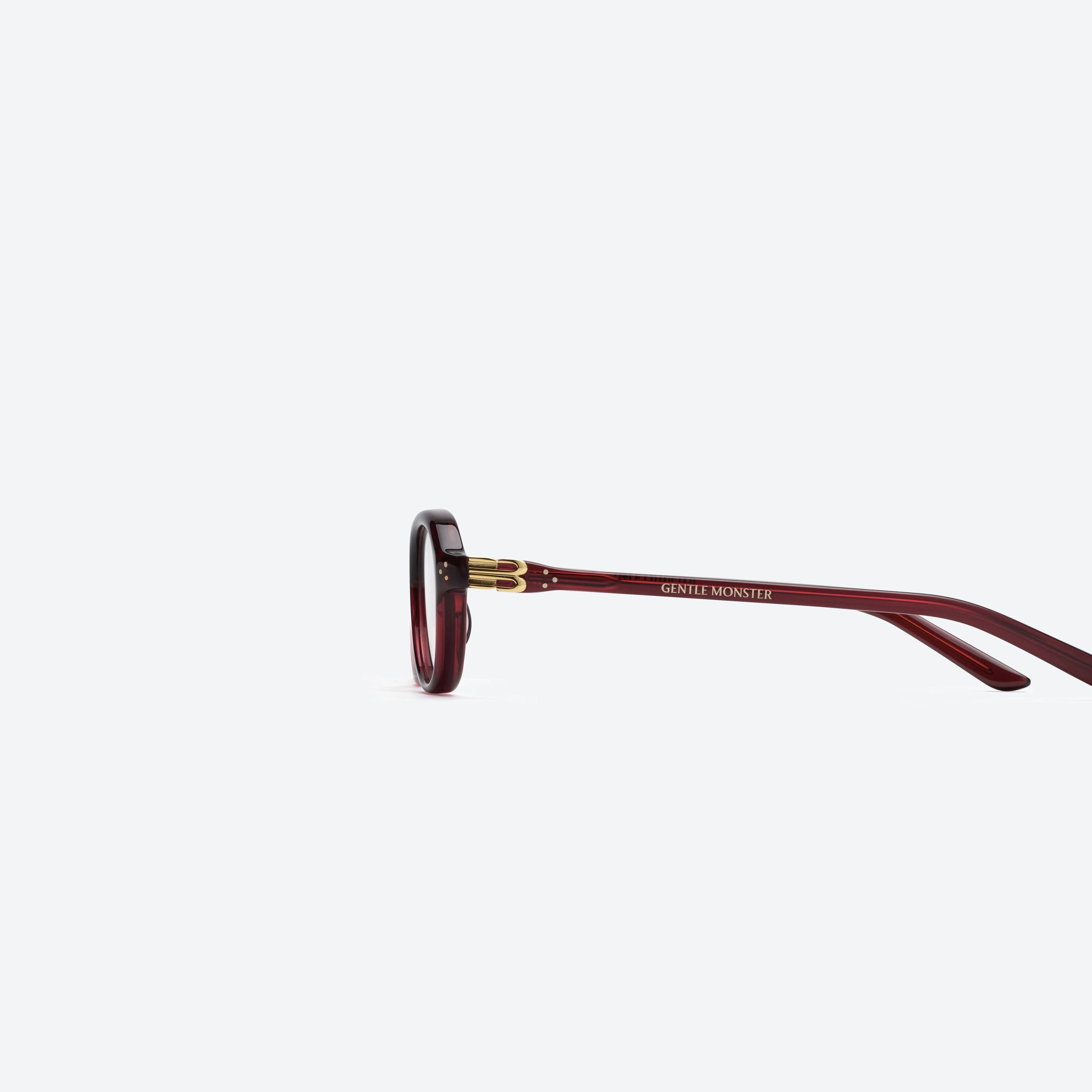 A detailed left view of Gentle Monster Be Slo RC7 Red Acetate framed Aviator glasses.