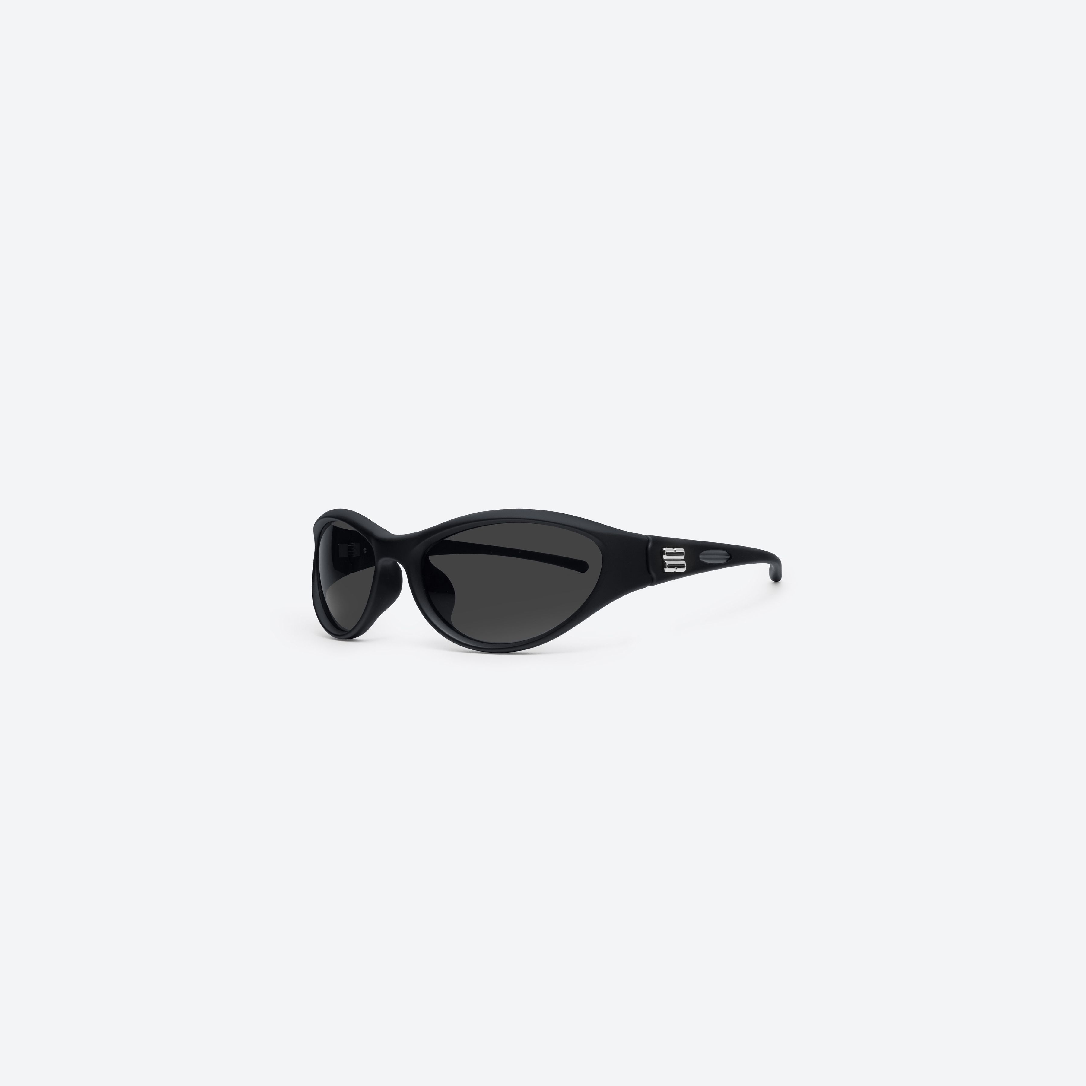 45-degree view of Gentle Monster Sugar Buff 01 Black Nylon framed Wraparound sunglasses.