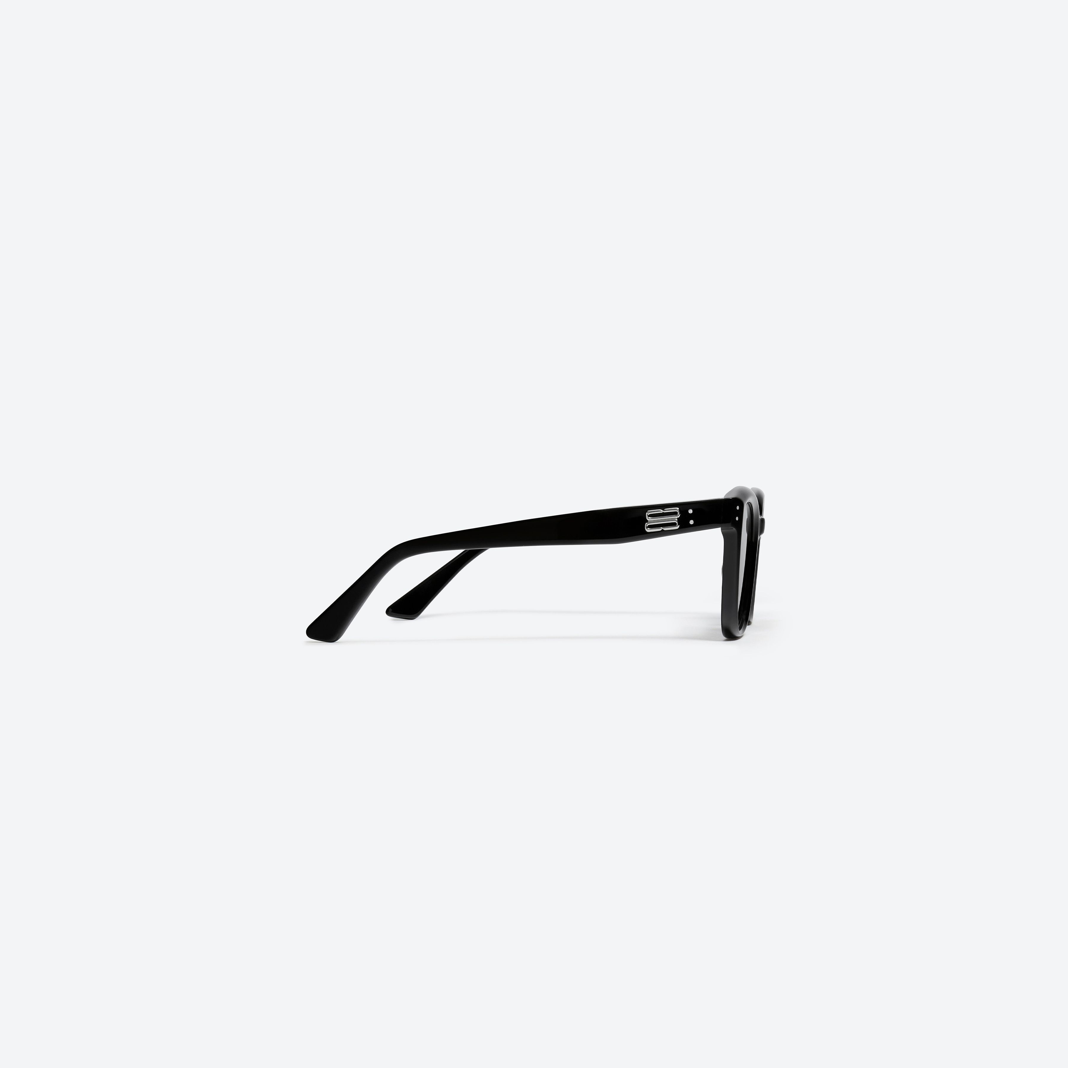 A detailed right view of Gentle Monster KUN - 0004 01 Black Acetate framed Square sunglasses.