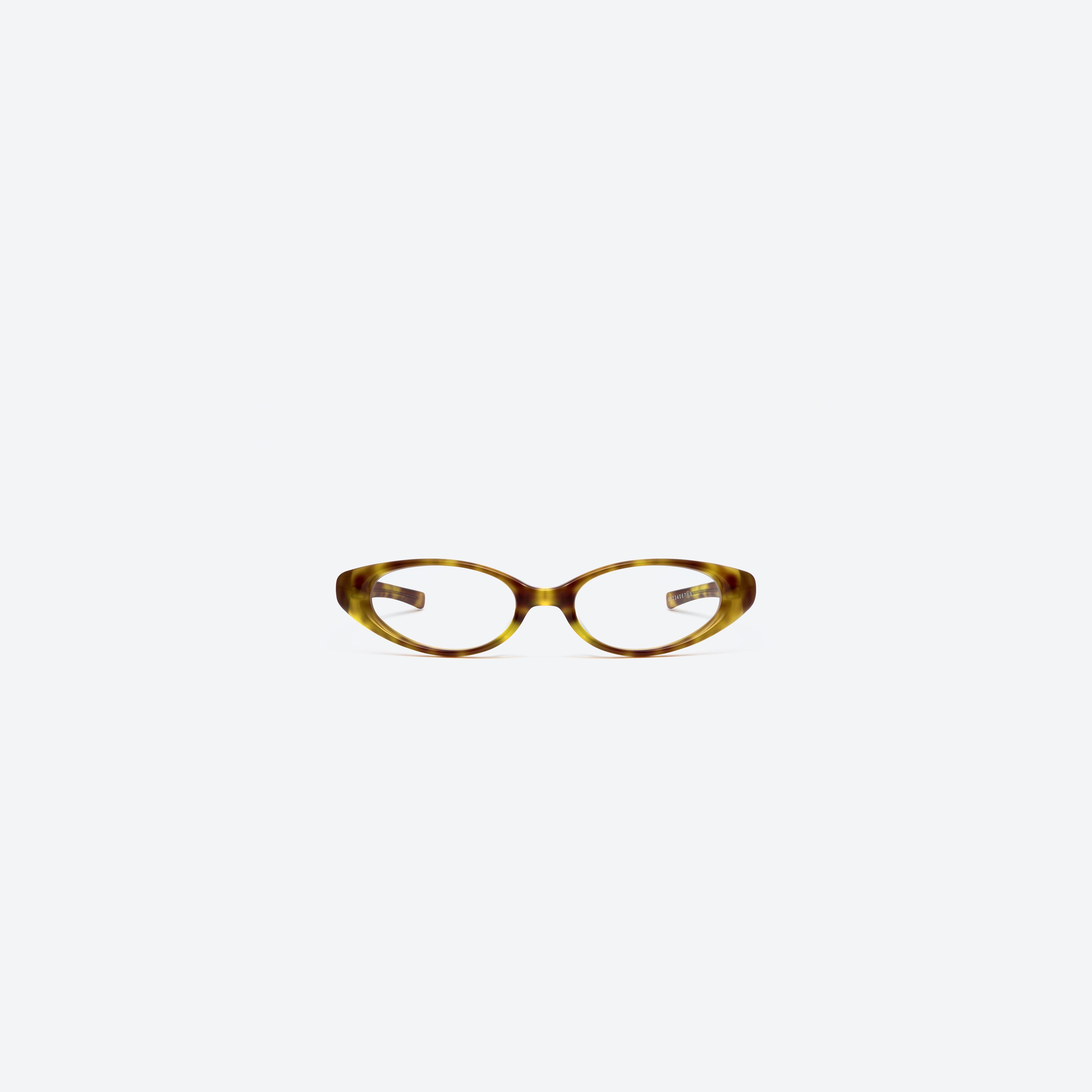 A front view of Gentle Monster Maison Margiela - MM213 T6 Tortoise Acetate framed Wraparound glasses.