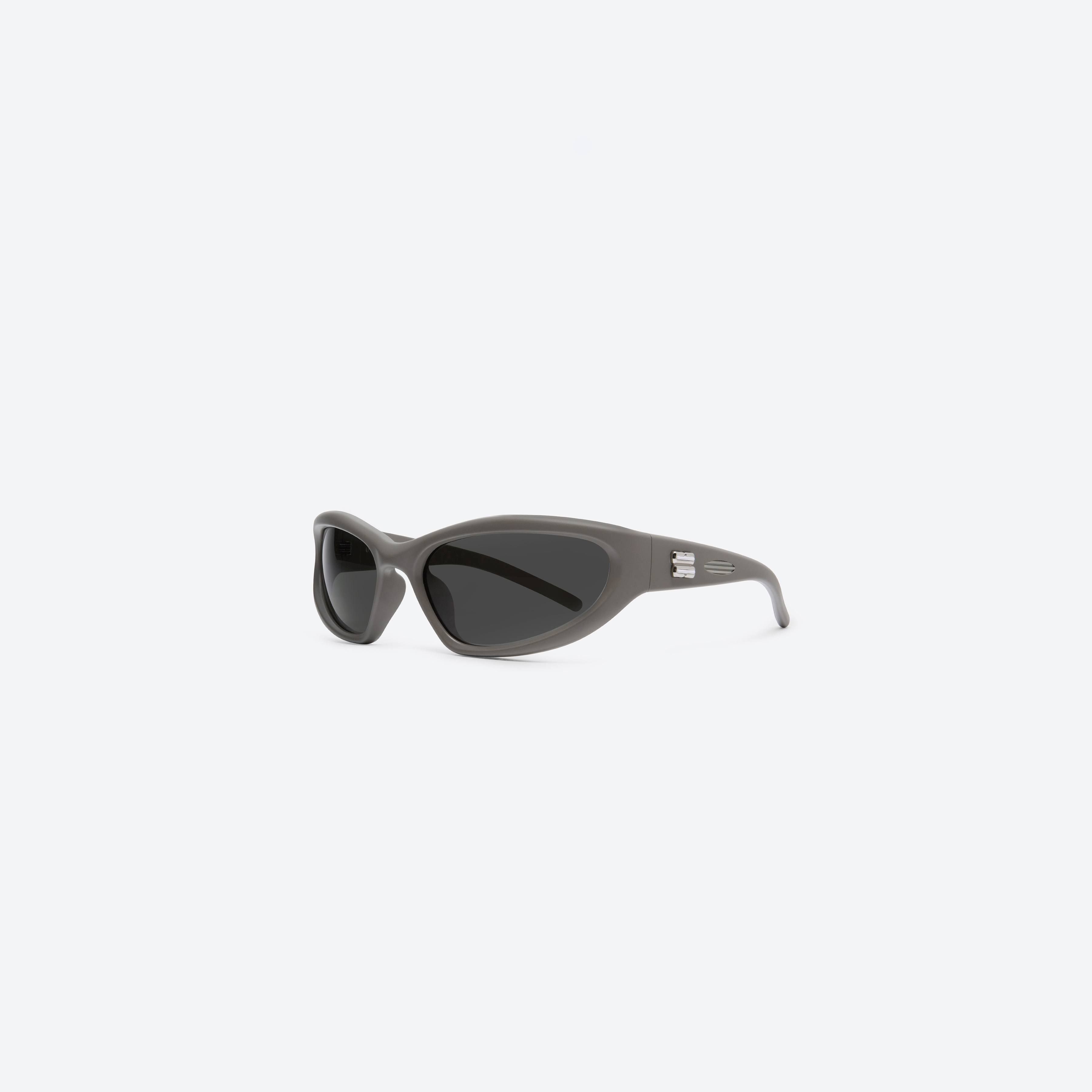 45-degree view of Gentle Monster Panna Cotta K5 Green Nylon framed Wraparound sunglasses.