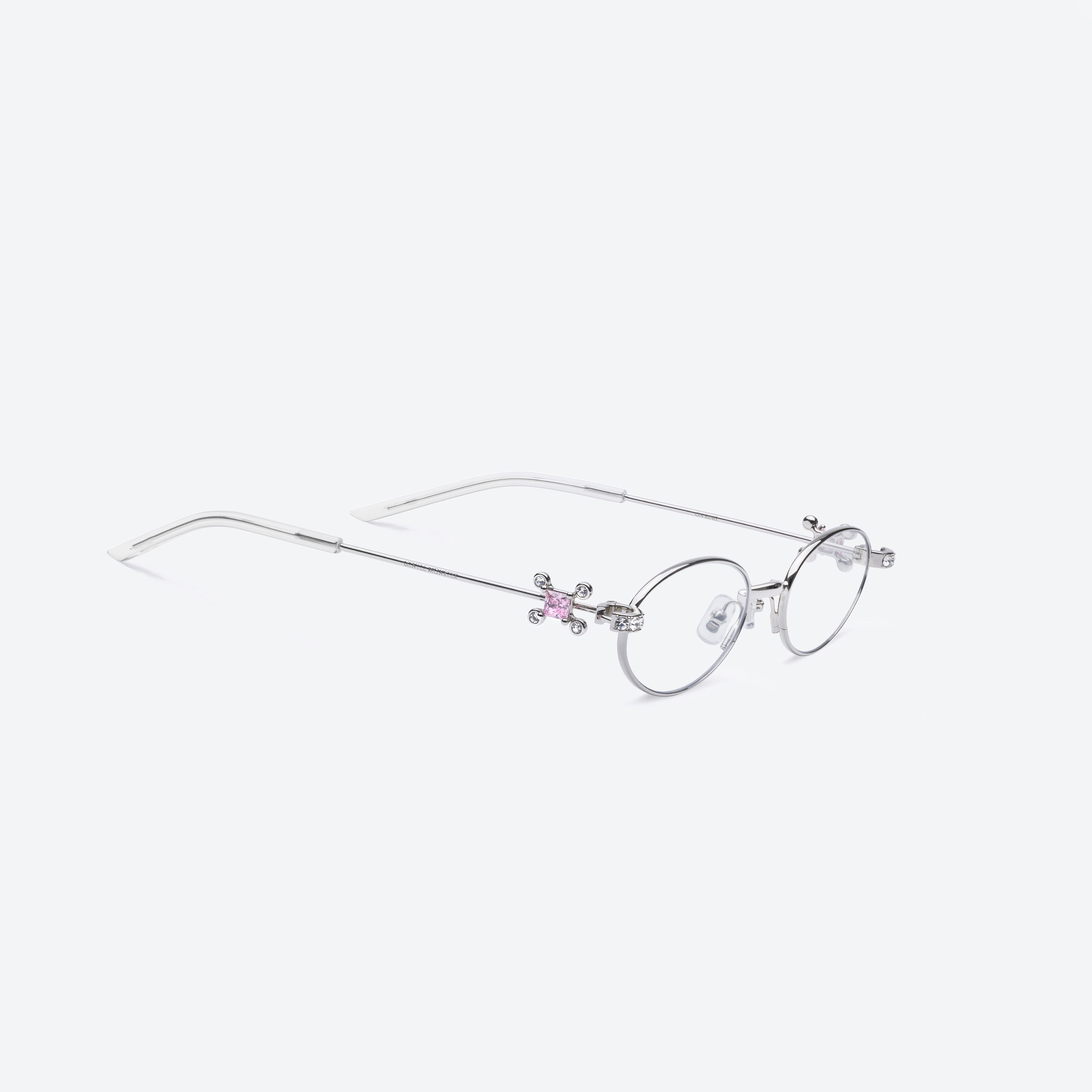45-degree detailed view of Gentle Monster On Ring 02 Silver Metal framed Oval sunglasses.