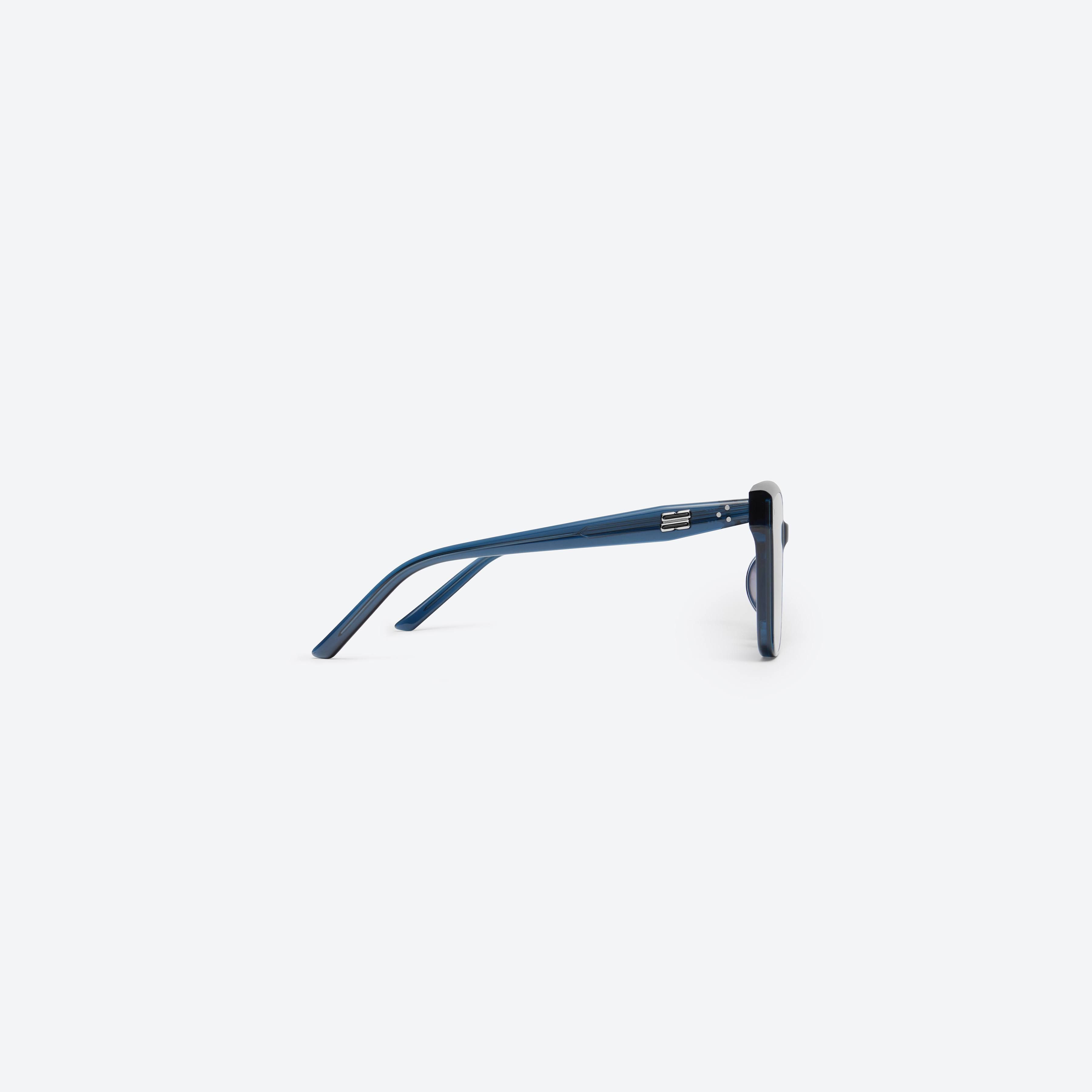 A detailed right view of Gentle Monster Dear NC2 Blue Acetate framed Square sunglasses.