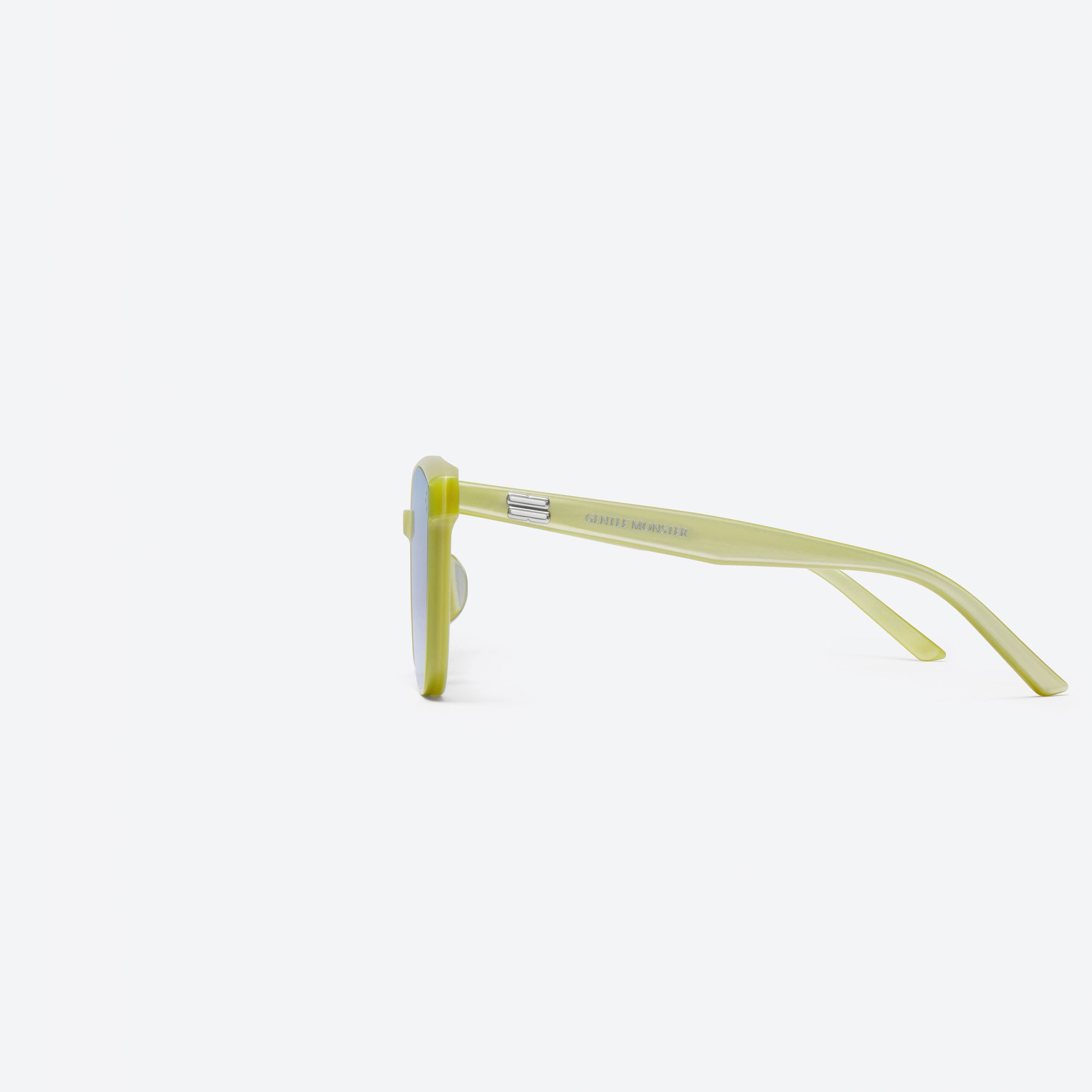 A detailed left view of Gentle Monster By Y9 Yellow Acetate framed Square sunglasses.