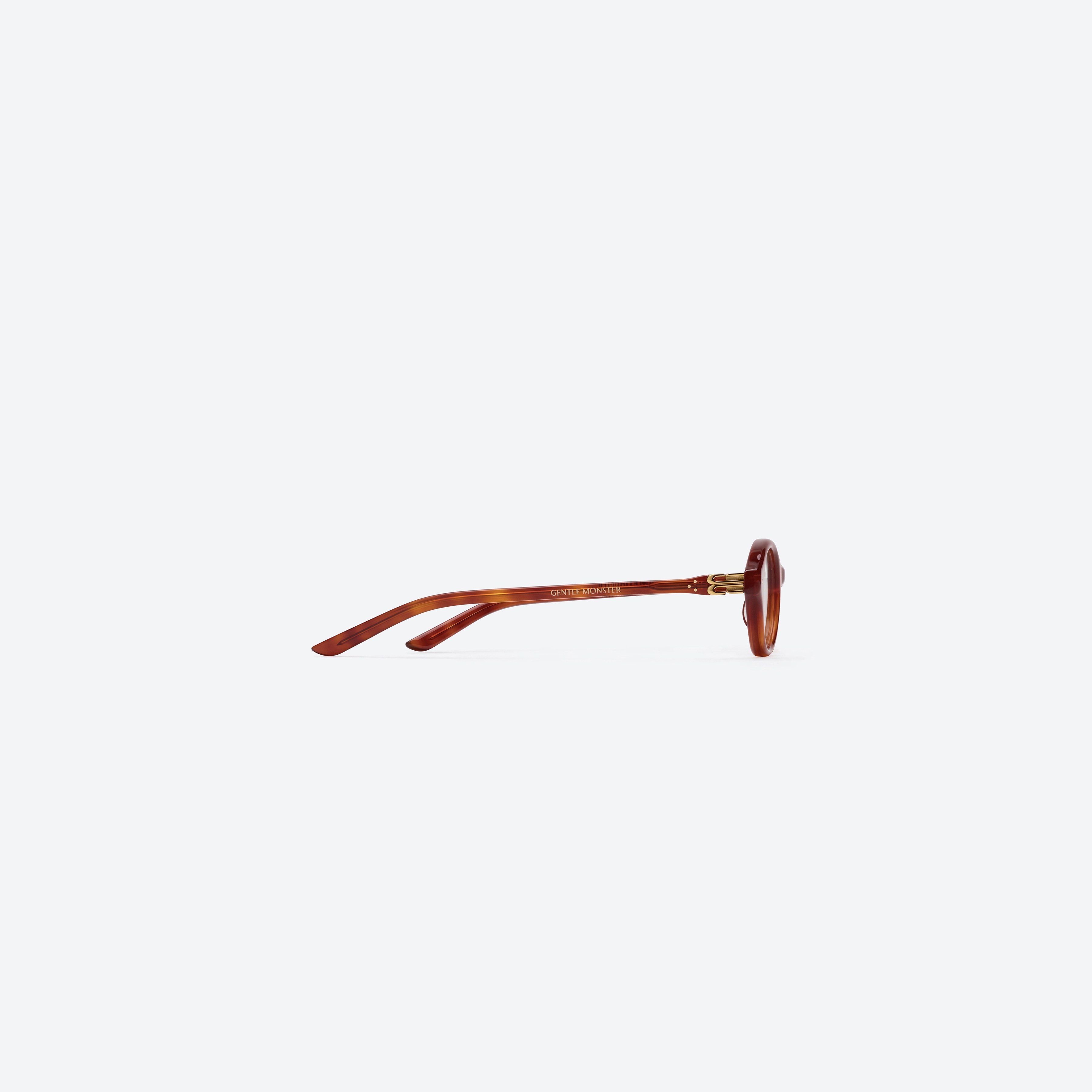 A detailed right view of Gentle Monster Corori T4 Tortoise Acetate framed Oval glasses.