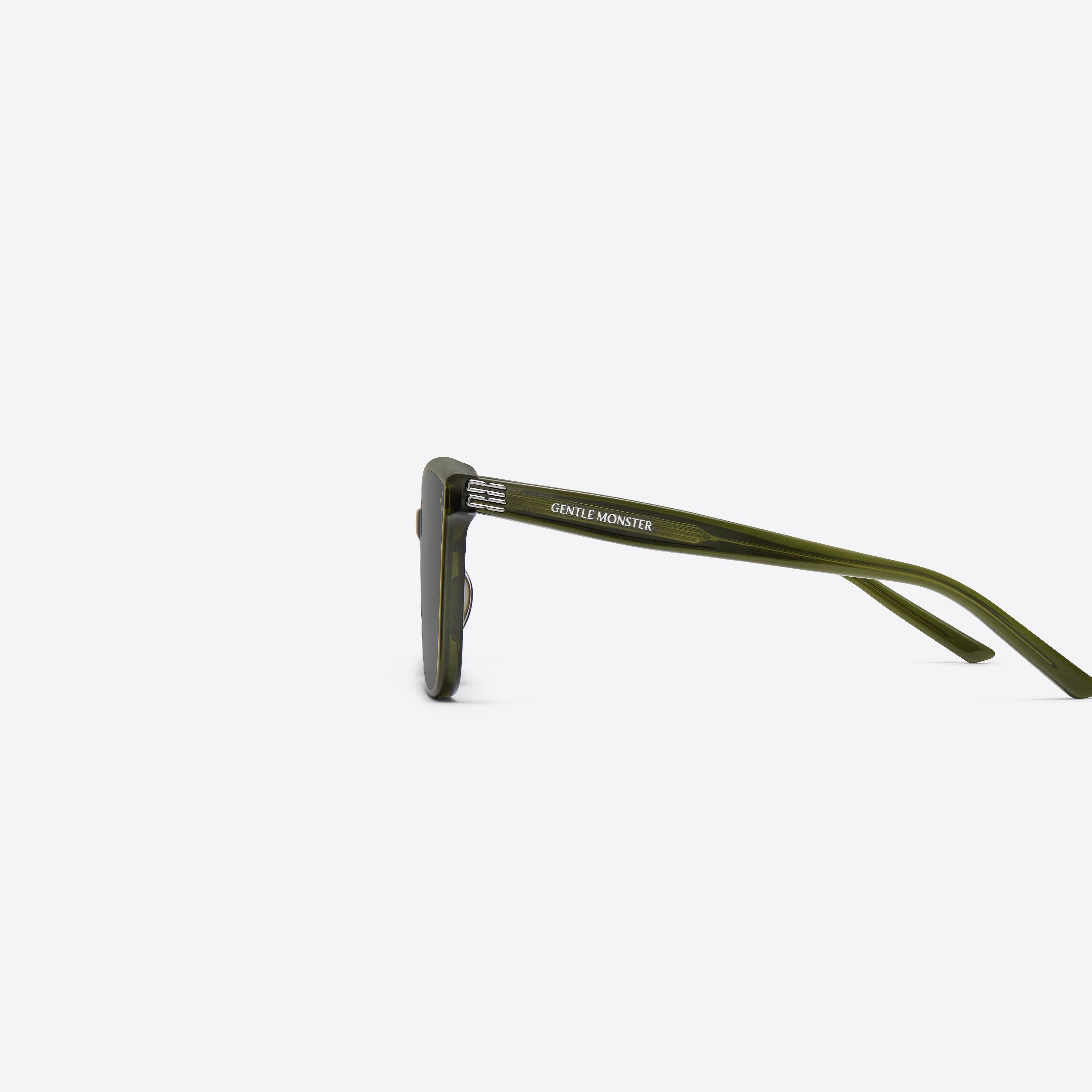 A detailed left view of Gentle Monster My Me KC2 Green Acetate framed Square sunglasses.