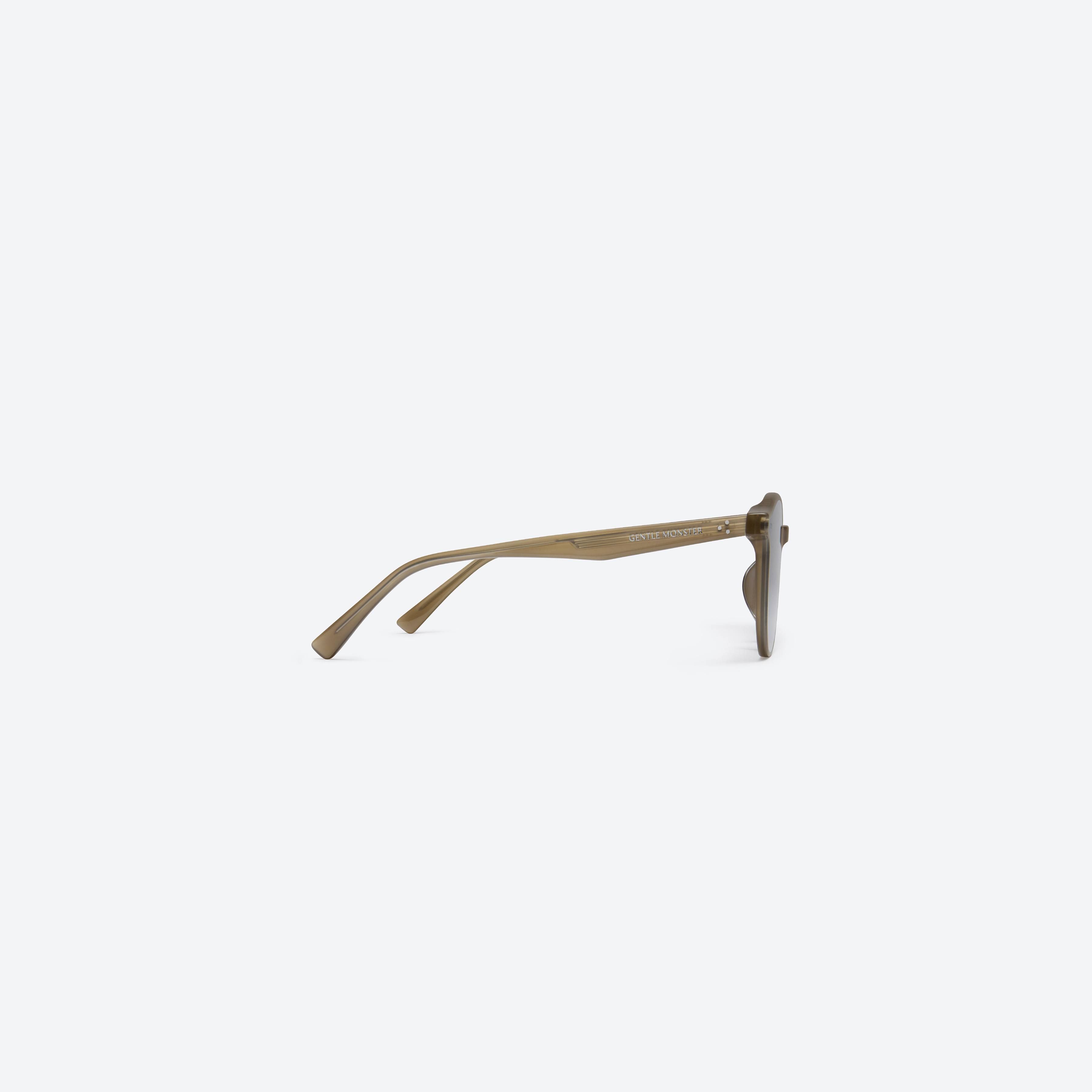 A detailed right view of Gentle Monster New Born BRC9 Brown Acetate framed Round sunglasses.