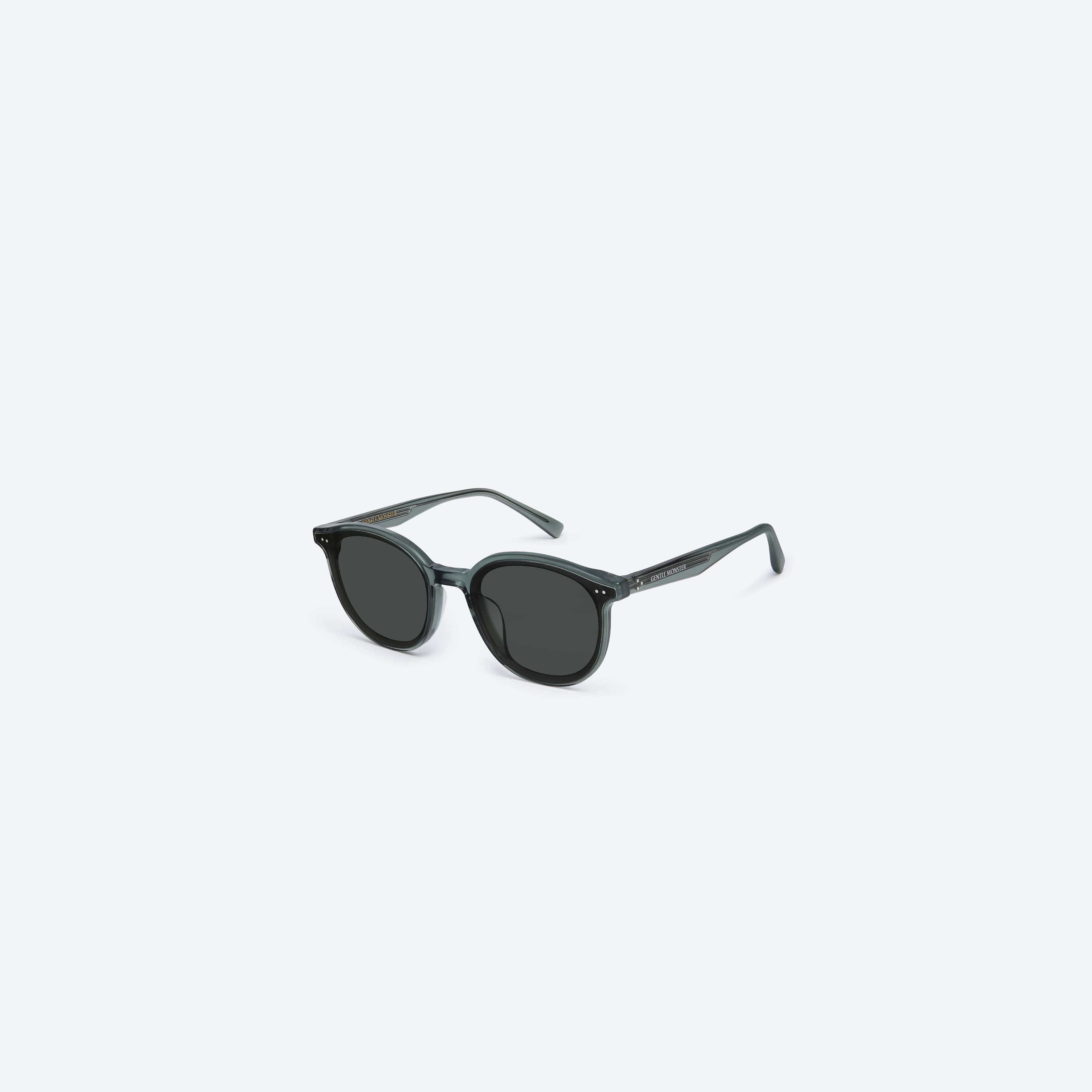 45-degree view of Gentle Monster New Born G3 Gray Acetate framed Round sunglasses.
