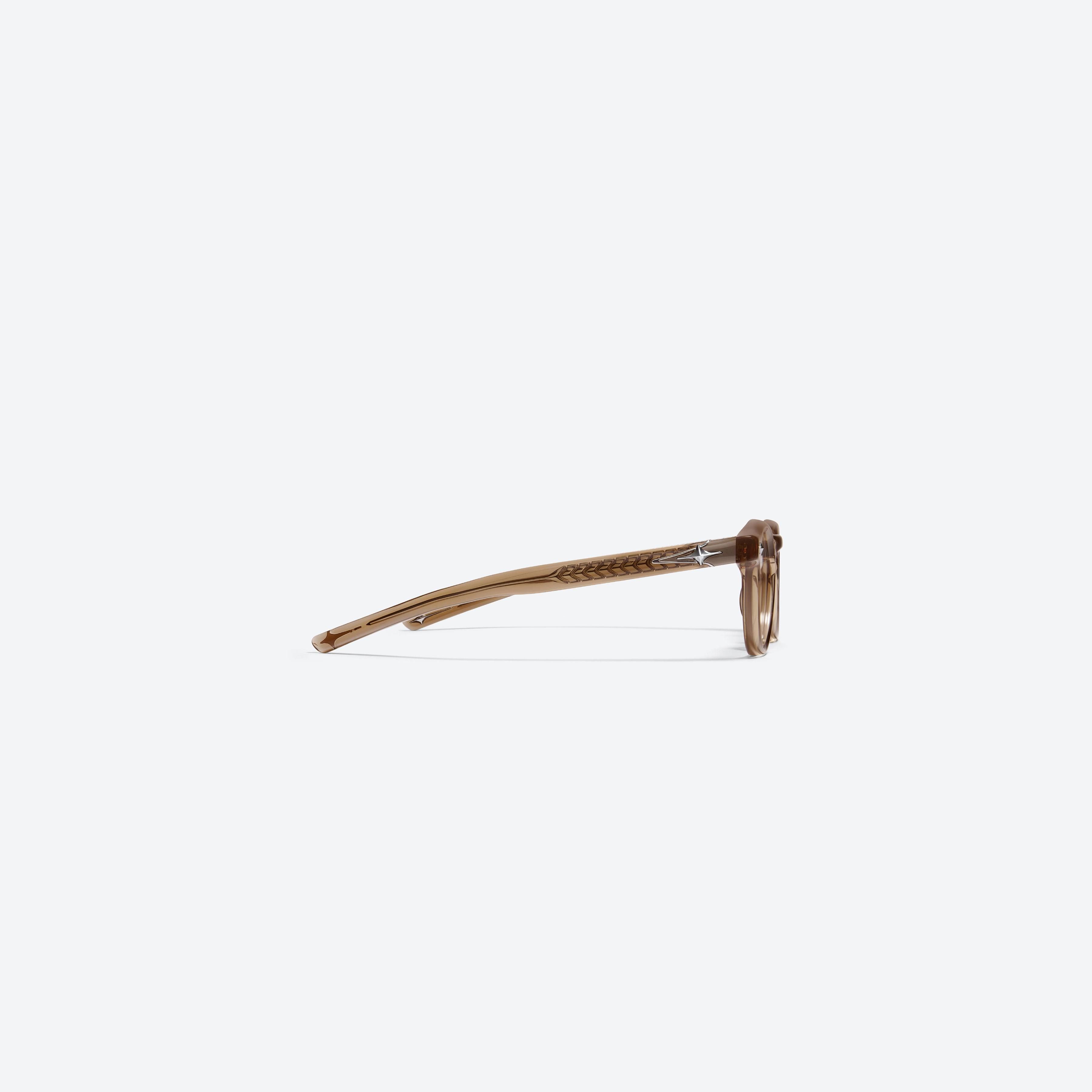 A detailed right view of Gentle Monster Ron BRC15 Brown Acetate framed Round glasses.