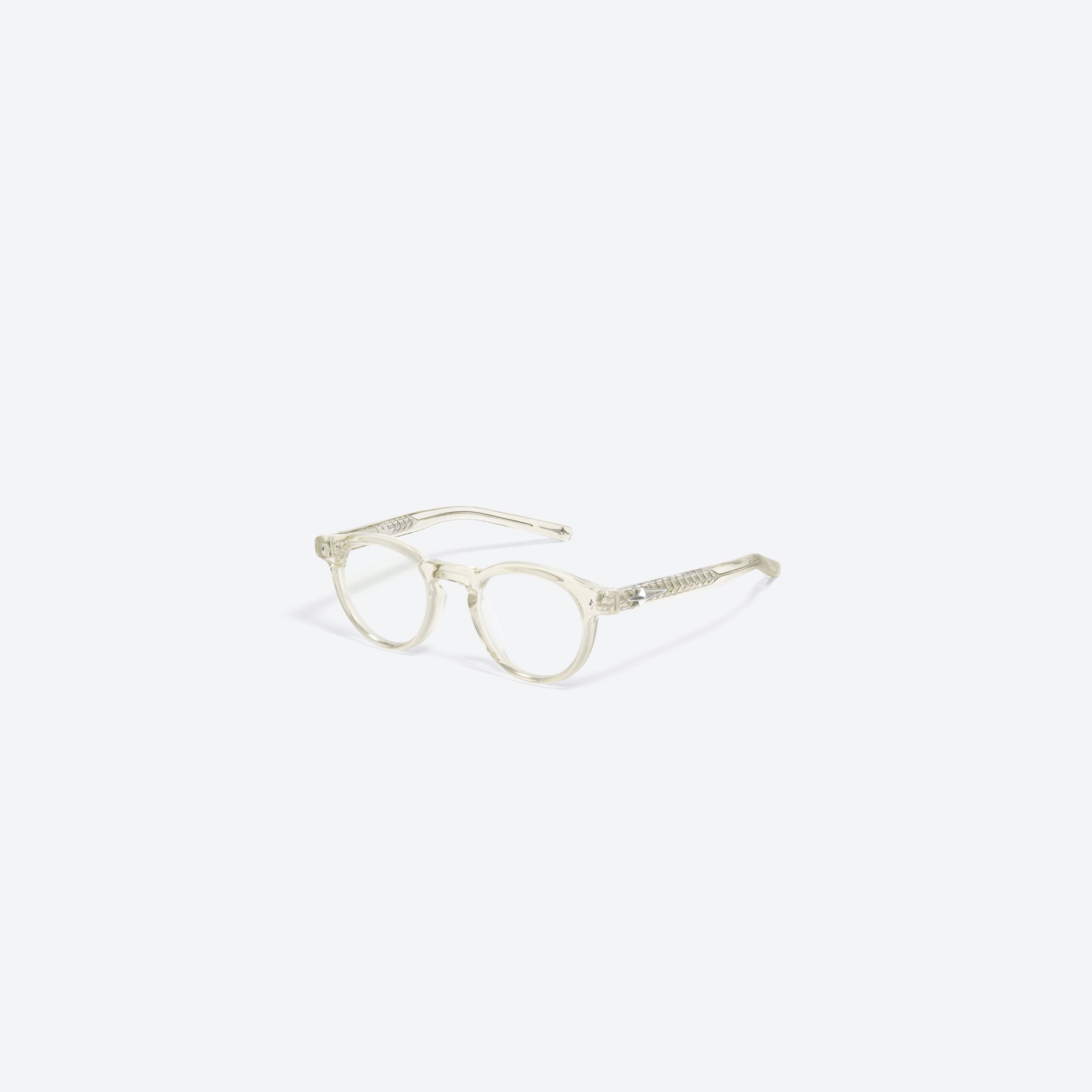 45-degree view of Gentle Monster Ron C4 Yellow Acetate framed Round glasses.