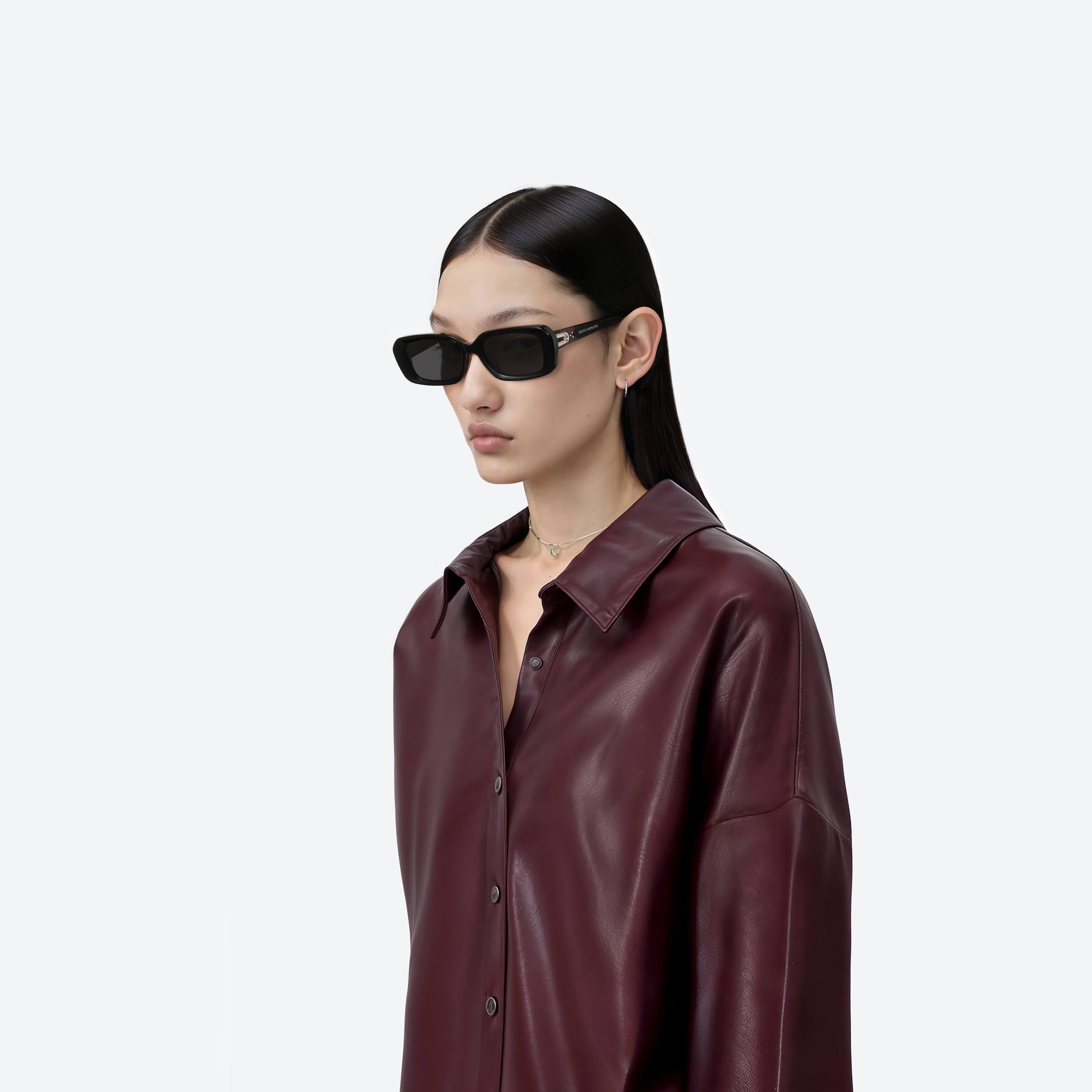Model wearing the MELROSE 01 Black Acetate framed Square sunglasses.