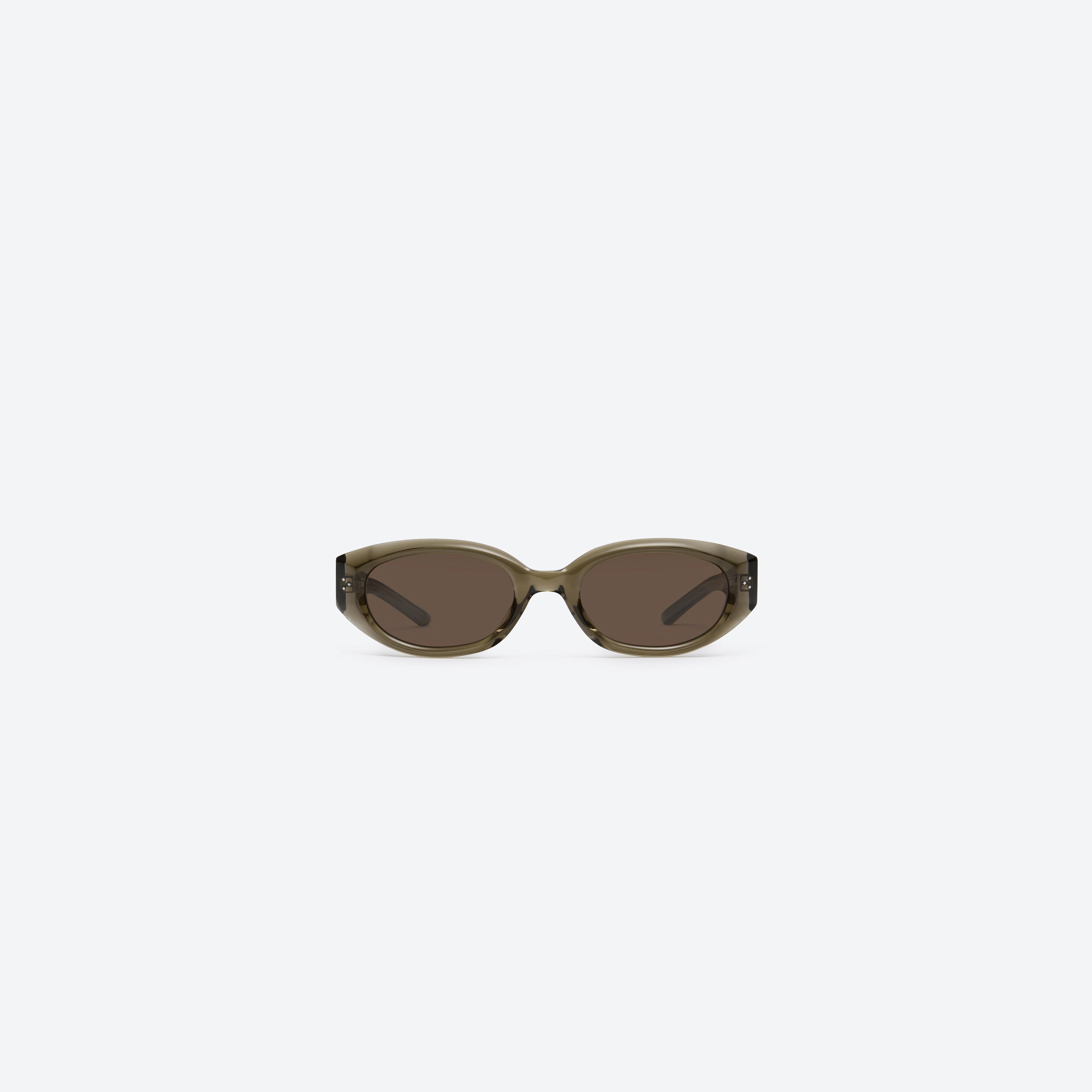 A front view of Gentle Monster VOID KC6 Green Acetate framed Oval sunglasses.