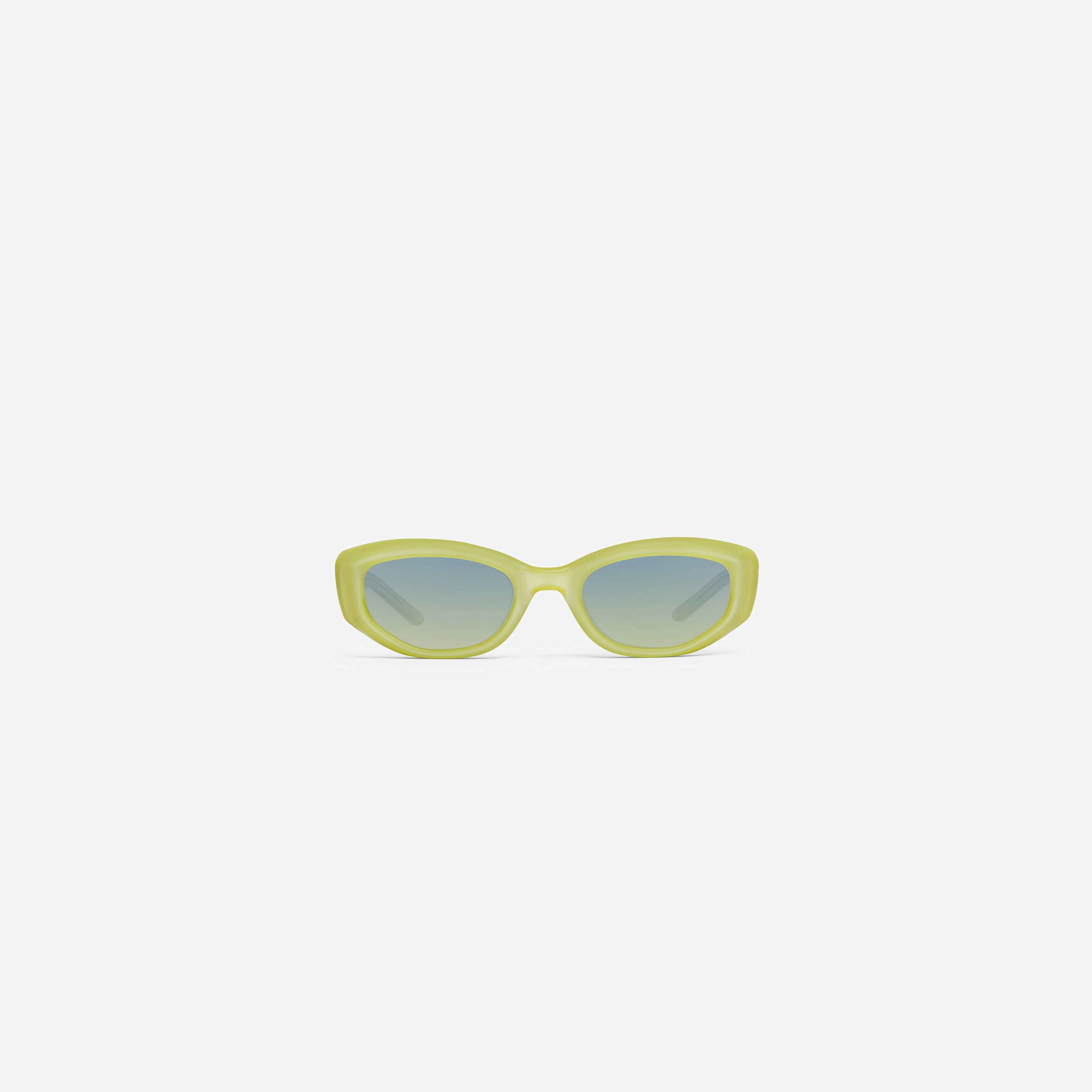 A front view of Gentle Monster Row Y9 Yellow Acetate framed Square sunglasses.