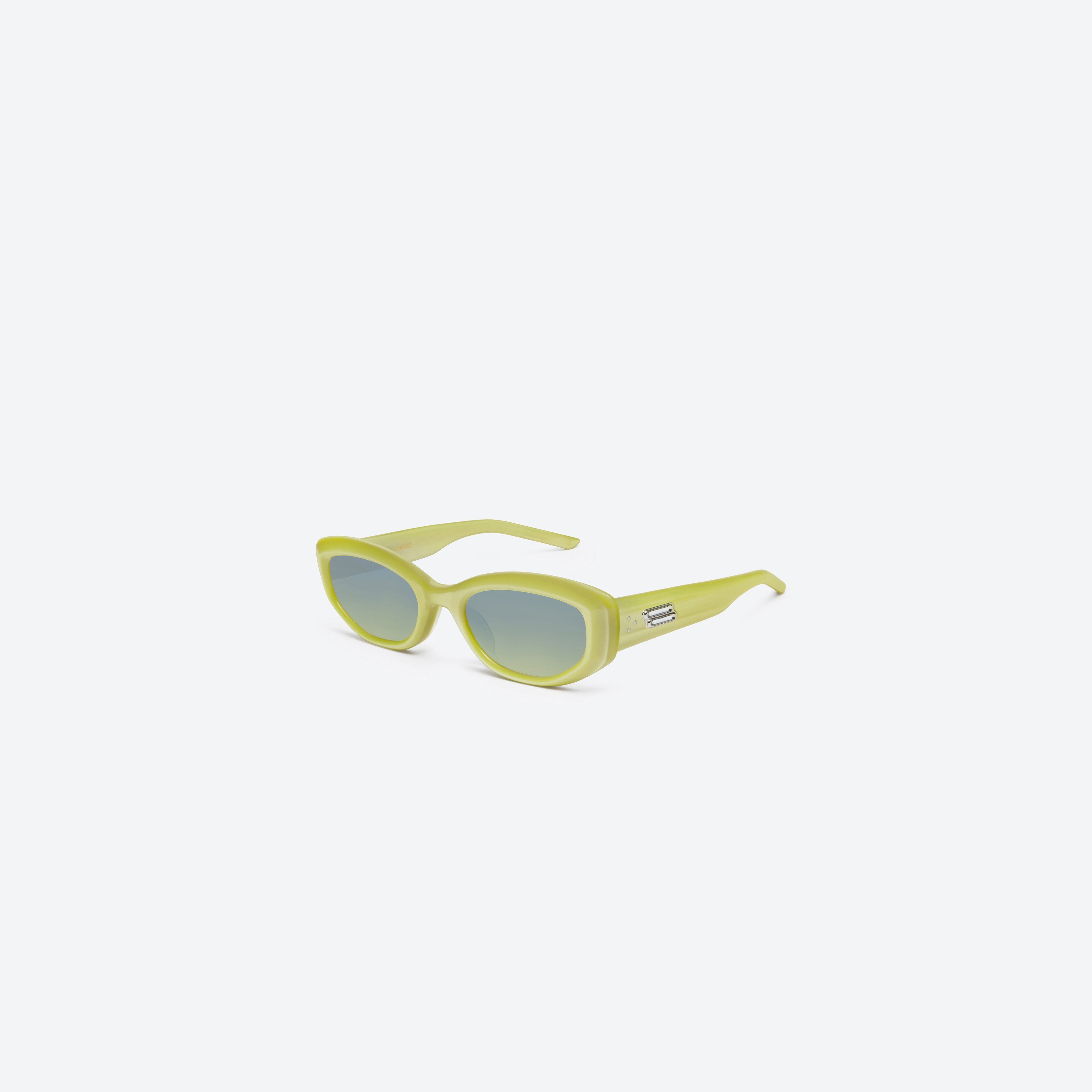 45-degree view of Gentle Monster Row Y9 Yellow Acetate framed Square sunglasses.