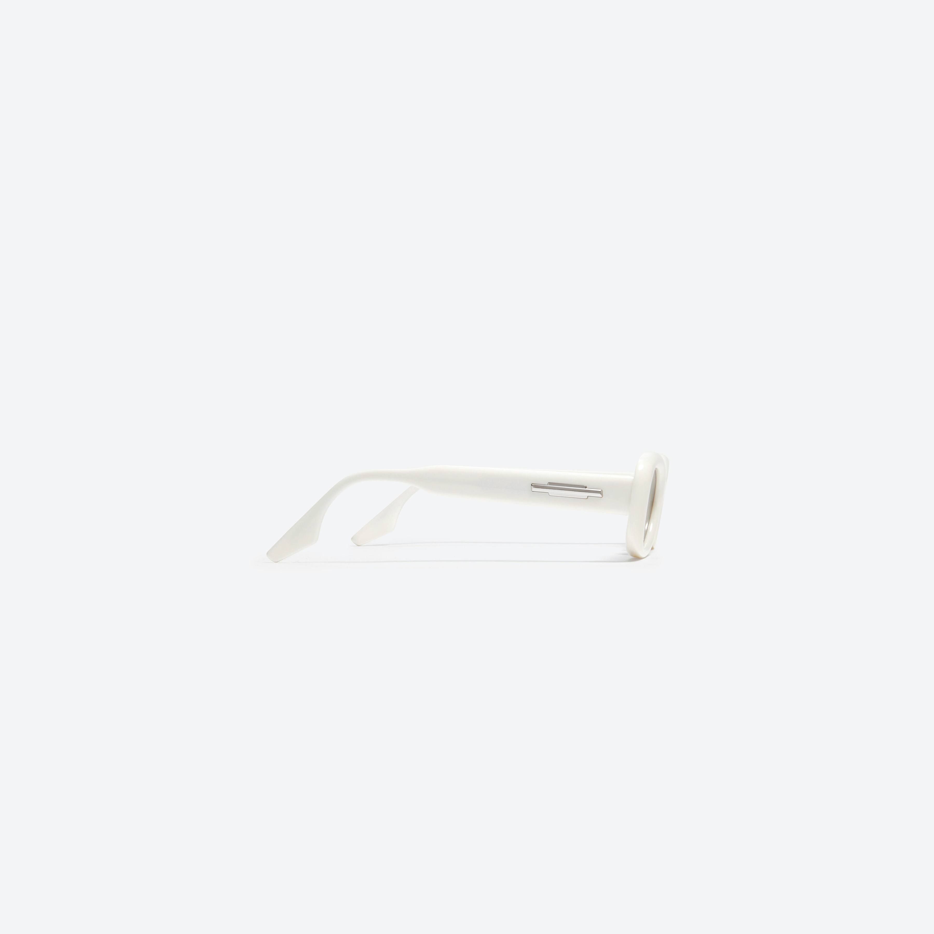A detailed right view of Gentle Monster Tambu W1 White Acetate framed Square sunglasses.