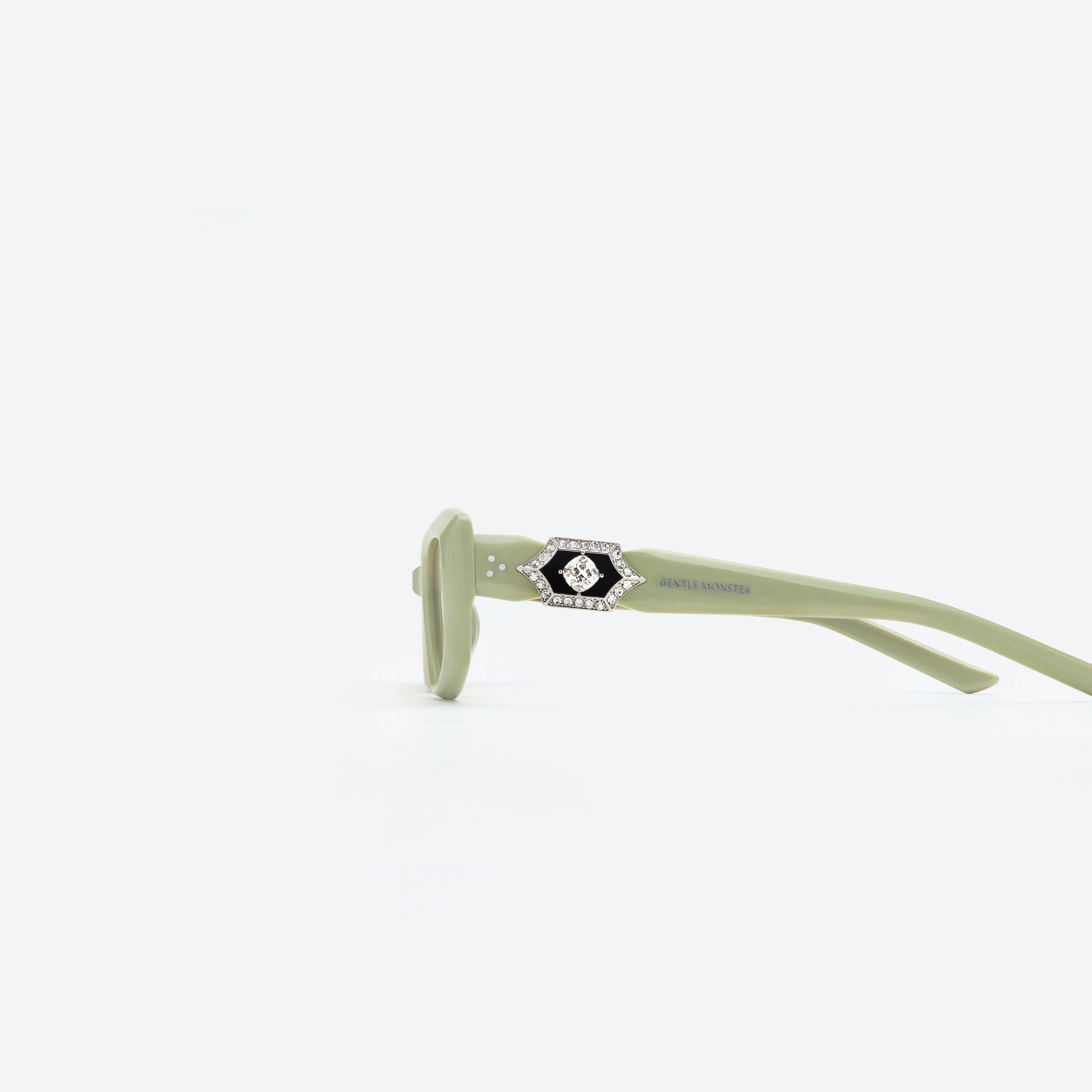 A detailed left view of Gentle Monster Demond GR9 Green Acetate framed Square sunglasses.
