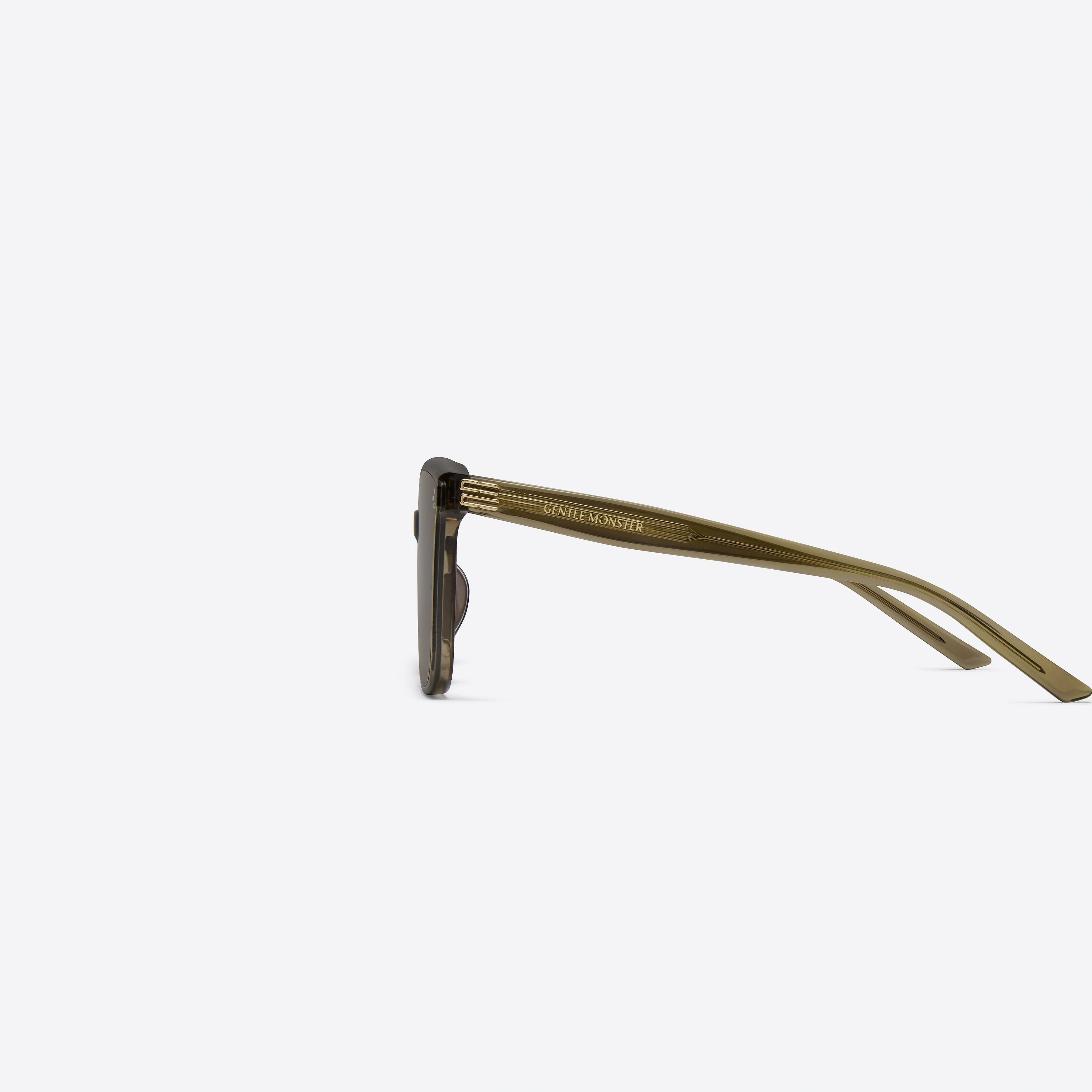 A detailed left view of Gentle Monster My Me KC6 Green Acetate framed Square sunglasses.