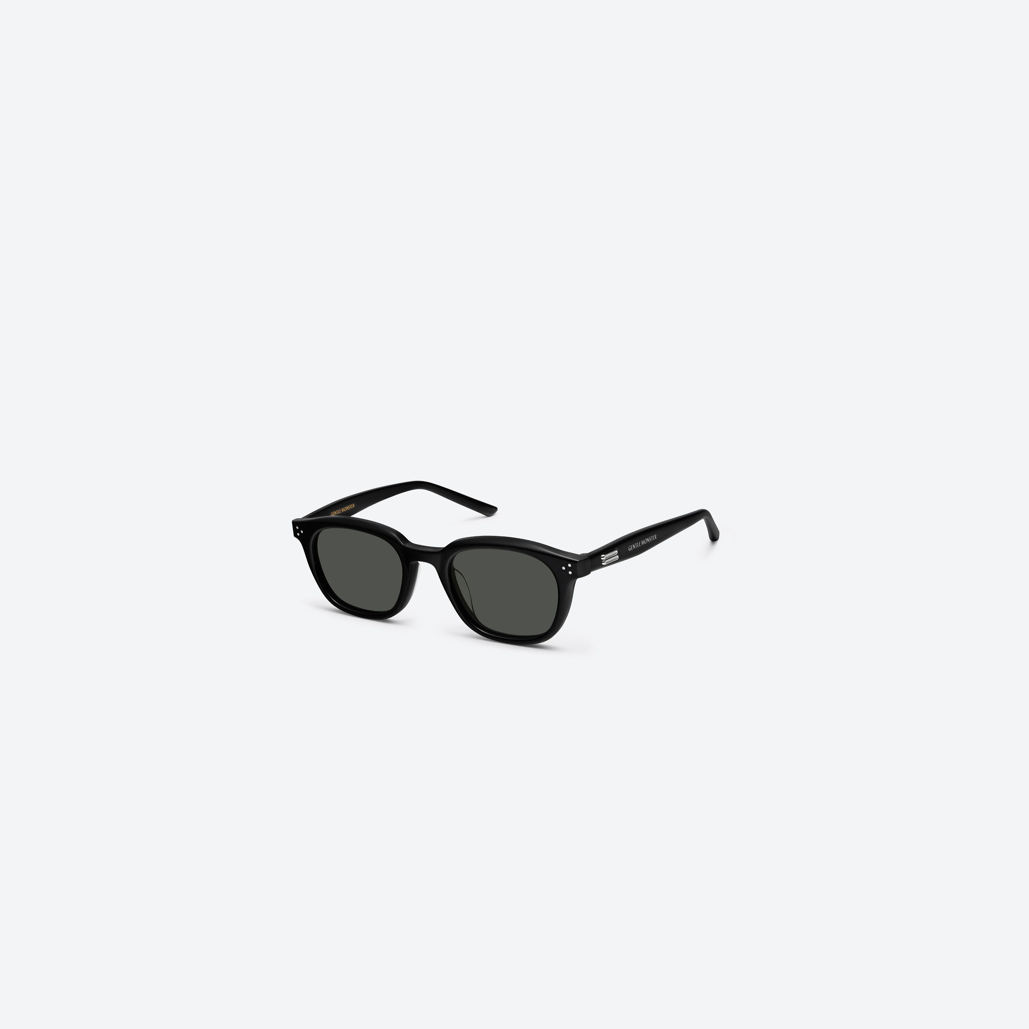 45-degree view of Gentle Monster Noho.s 01 Black Acetate framed Round sunglasses.