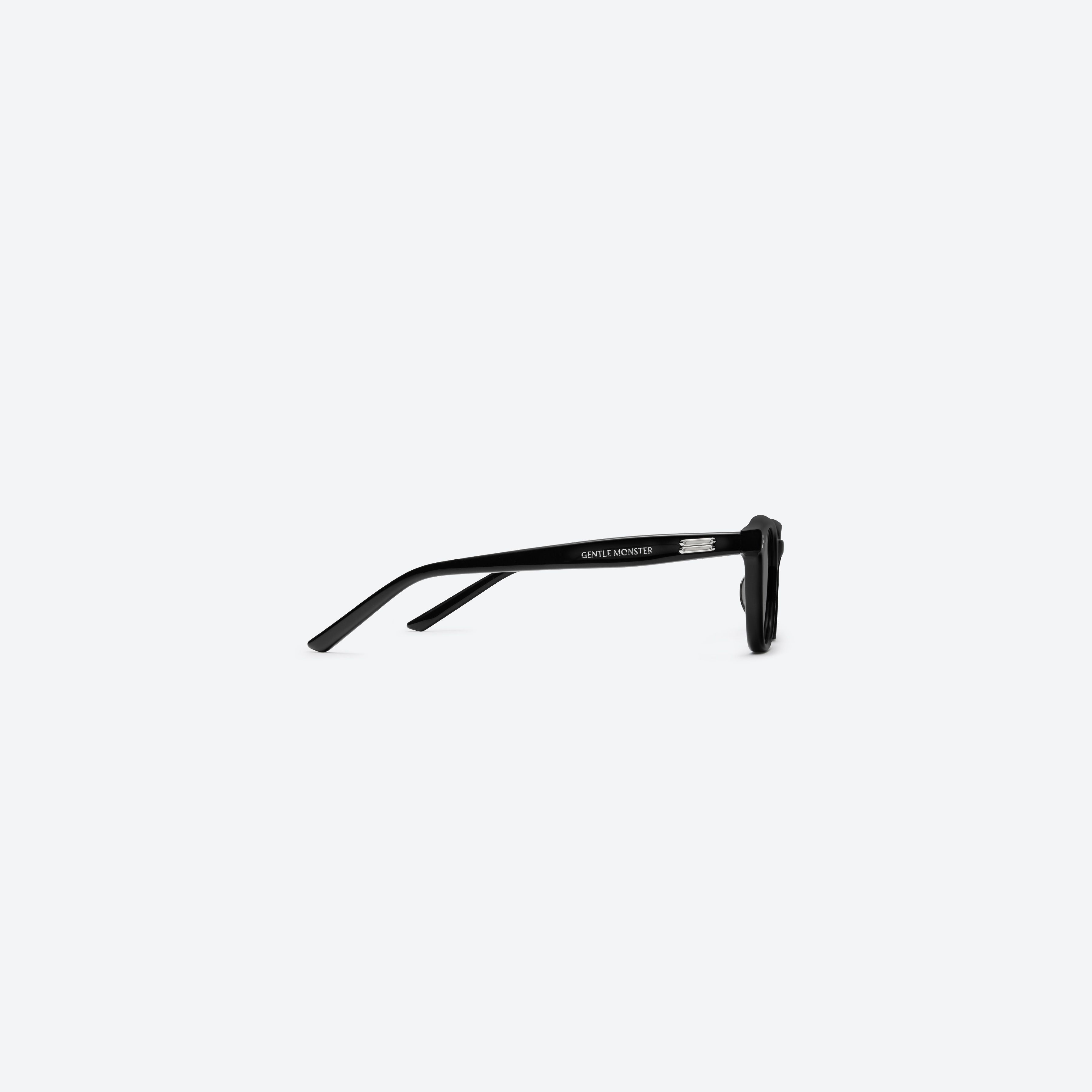 A detailed right view of Gentle Monster Noho.s 01 Black Acetate framed Round sunglasses.