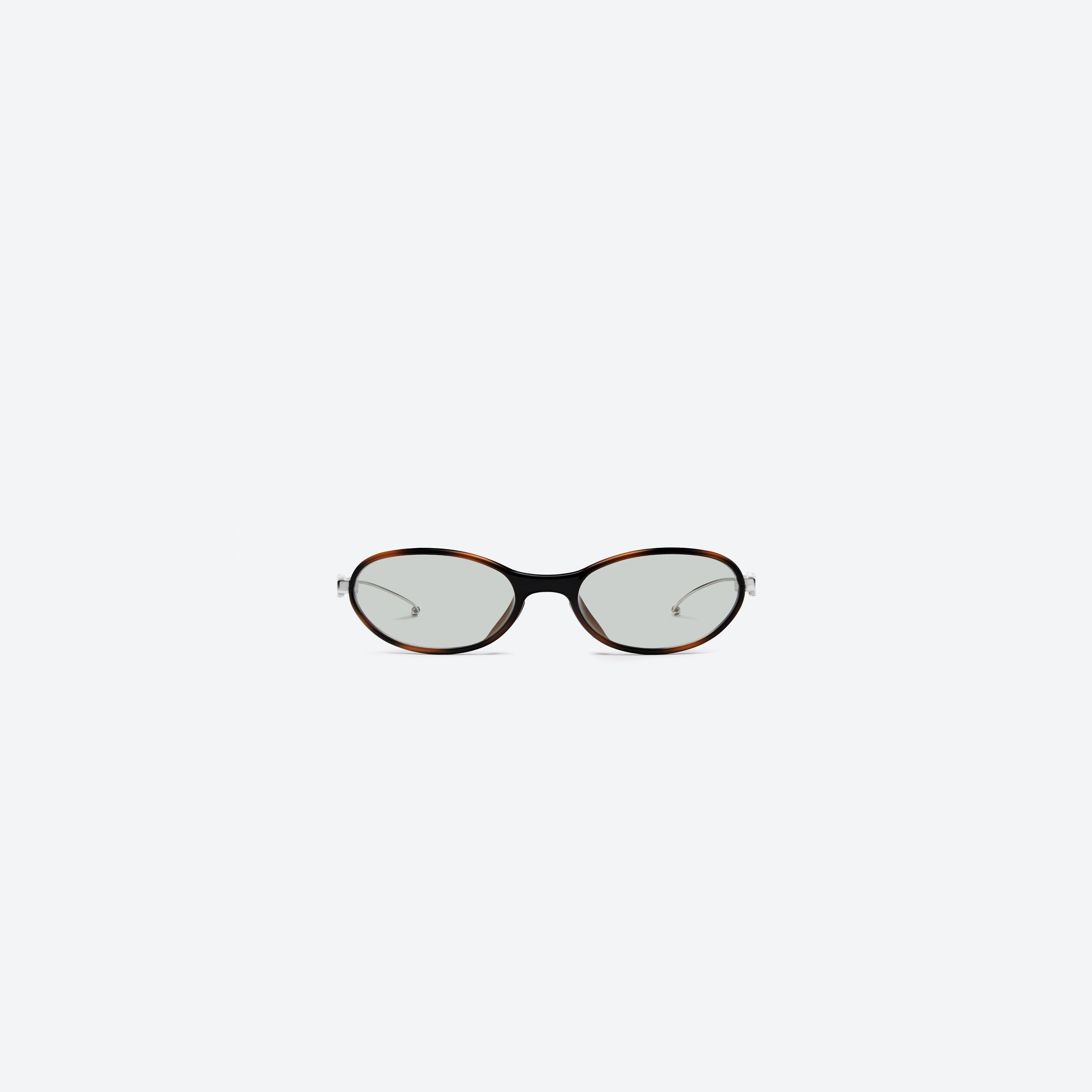 A front view of Gentle Monster Maison Margiela - MM318 L2 Brown Metal framed Oval sunglasses.