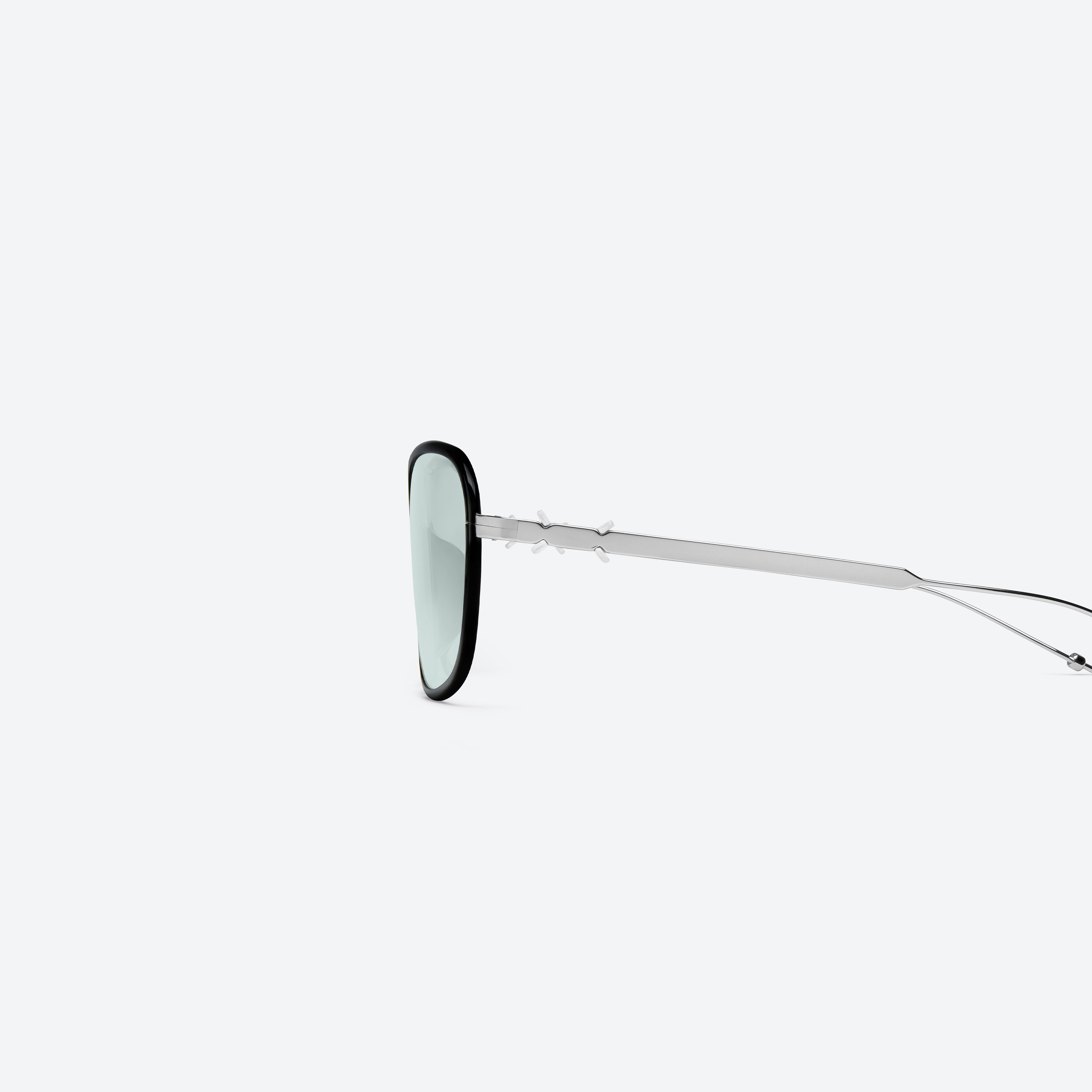 A detailed left view of Gentle Monster Maison Margiela - MM319 01 Black Metal framed Aviator sunglasses.