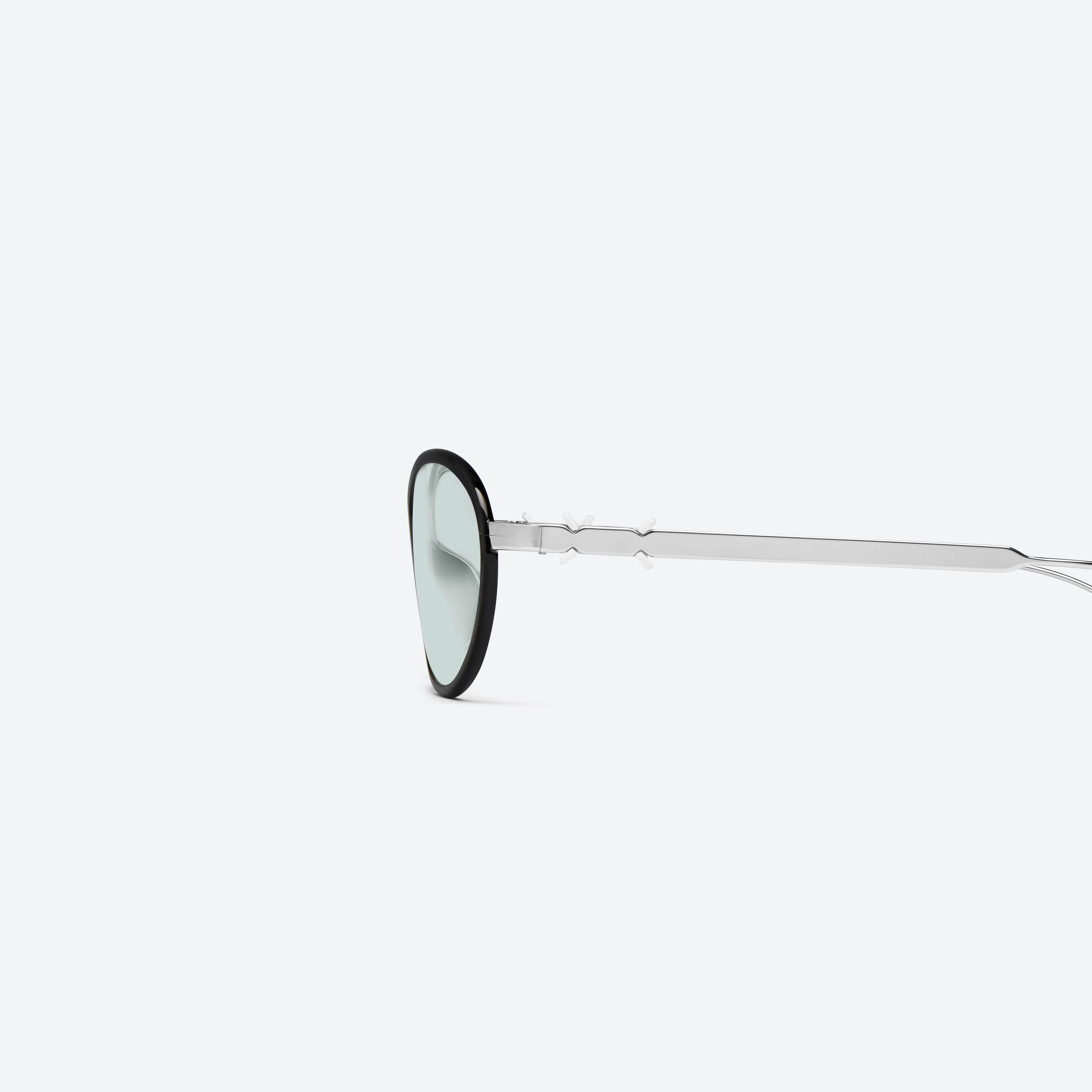 A detailed left view of Gentle Monster Maison Margiela - MM320 01 Black Metal framed Aviator sunglasses.
