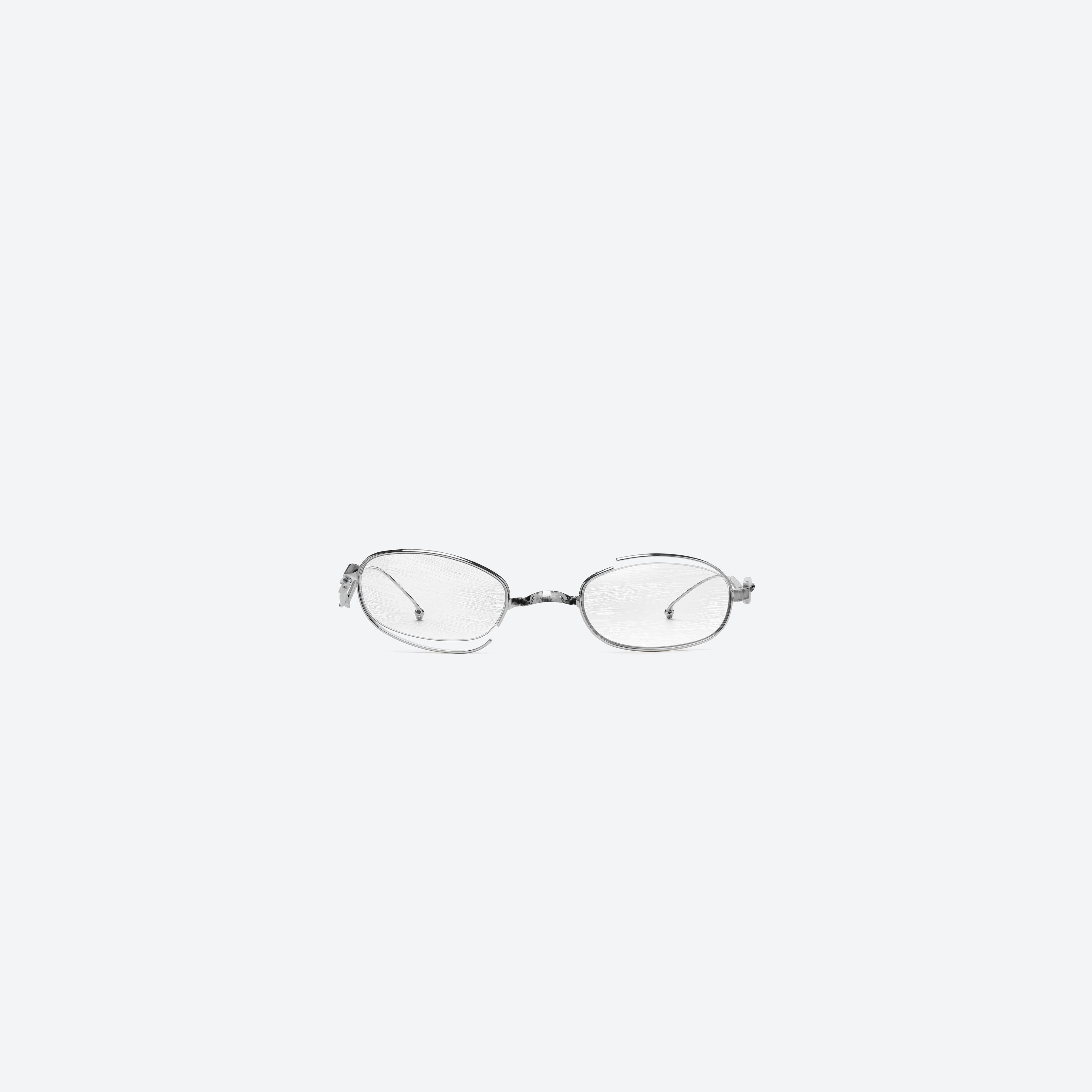 A front view of Gentle Monster Maison Margiela - MM301 02 Silver Metal framed Oval glasses.