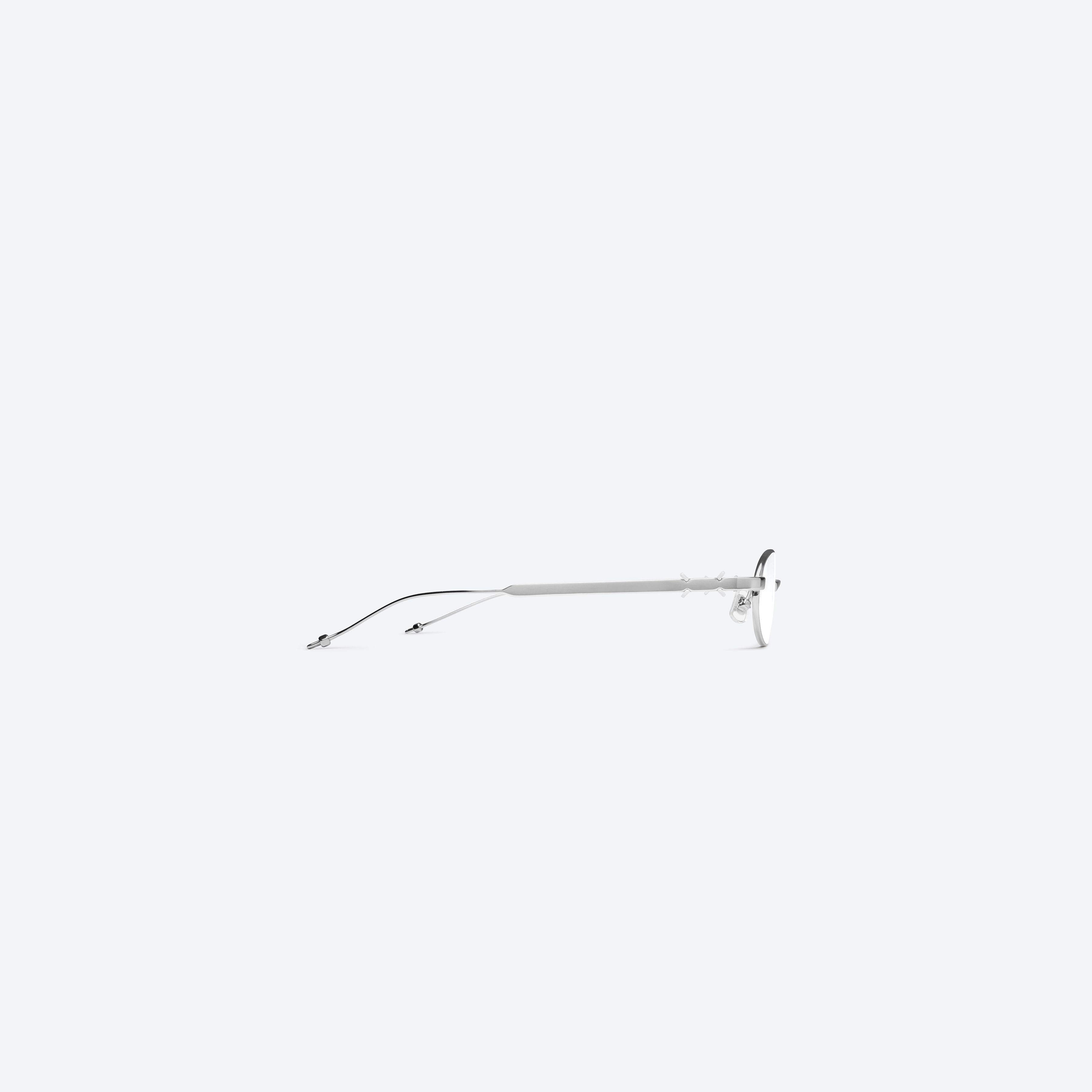 A detailed right view of Gentle Monster Maison Margiela - MM321 02 Silver Metal framed Oval glasses.
