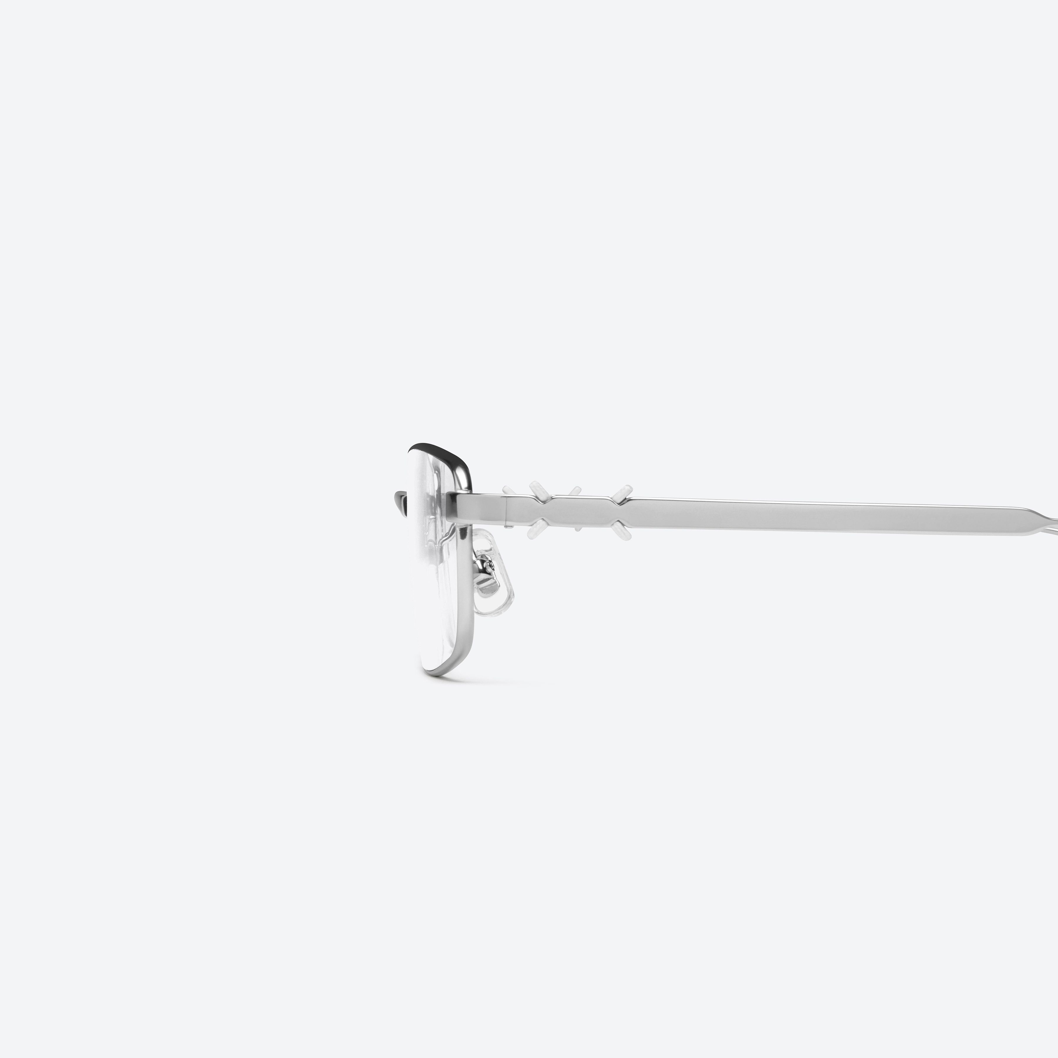 A detailed left view of Gentle Monster Maison Margiela - MM322 02 Silver Metal framed Square glasses.