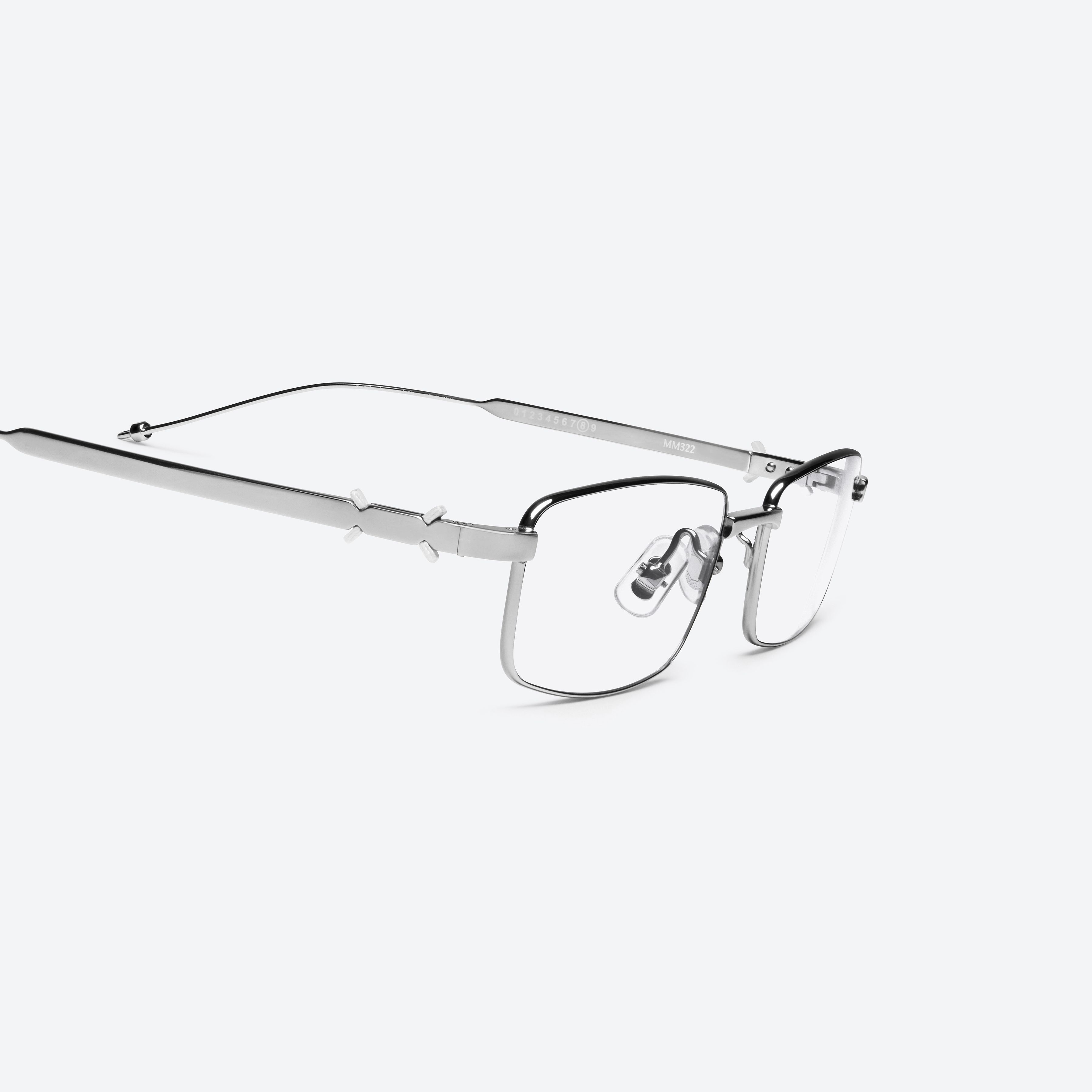 45-degree detailed view of Gentle Monster Maison Margiela - MM322 02 Silver Metal framed Square glasses.
