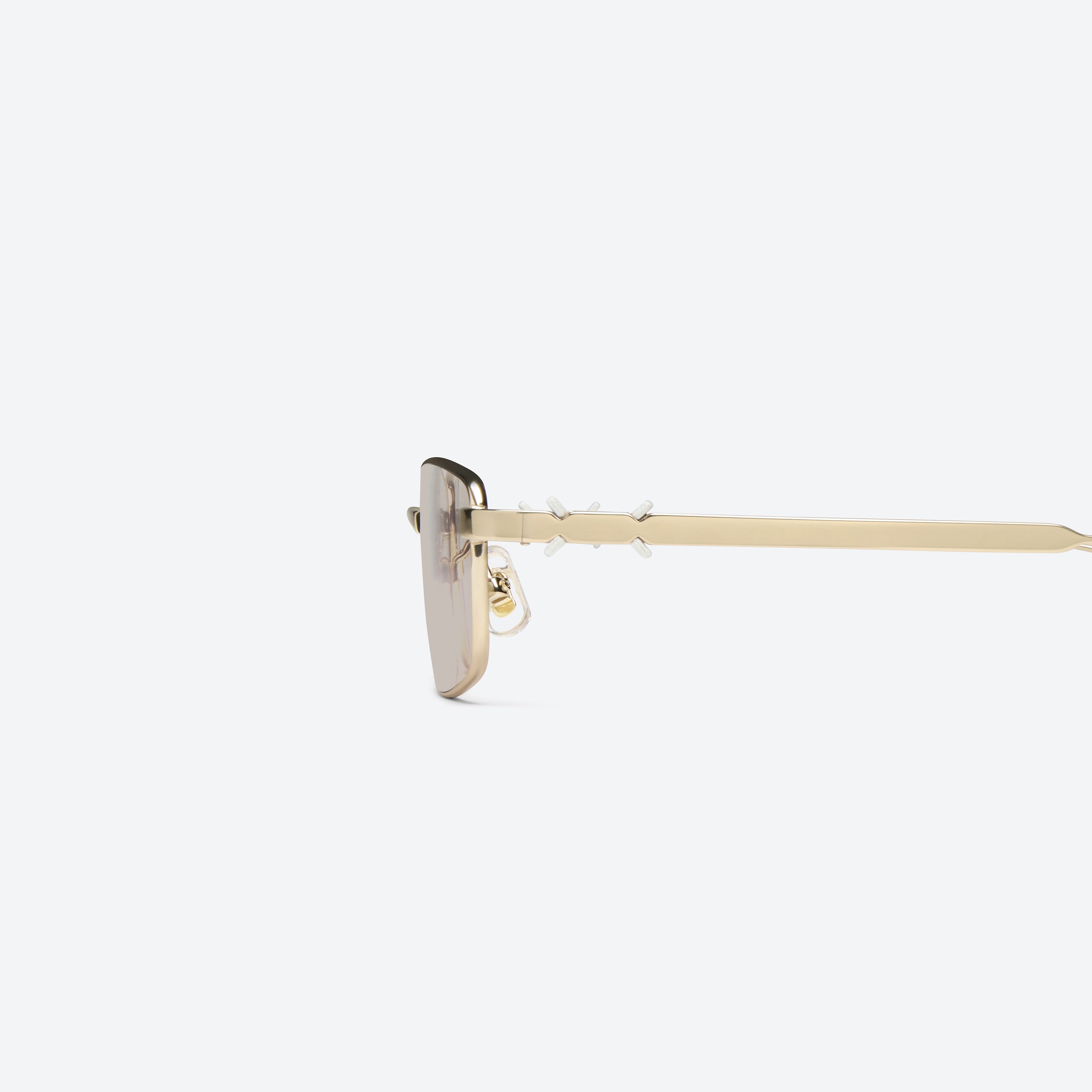 A detailed left view of Gentle Monster Maison Margiela - MM322 039 Gold Metal framed Square sunglasses.