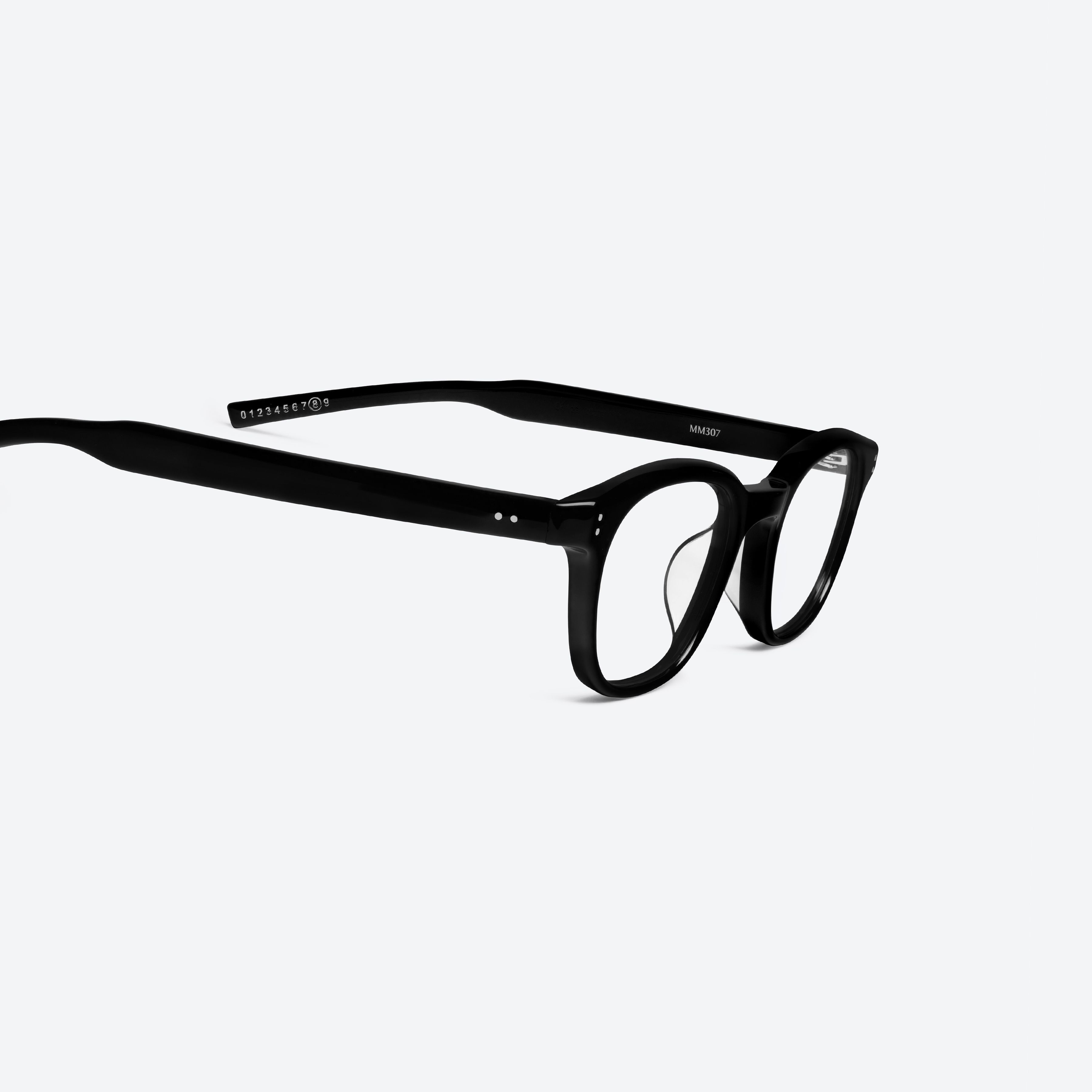 45-degree detailed view of Gentle Monster Maison Margiela - MM307 01 Black Acetate framed Square glasses.
