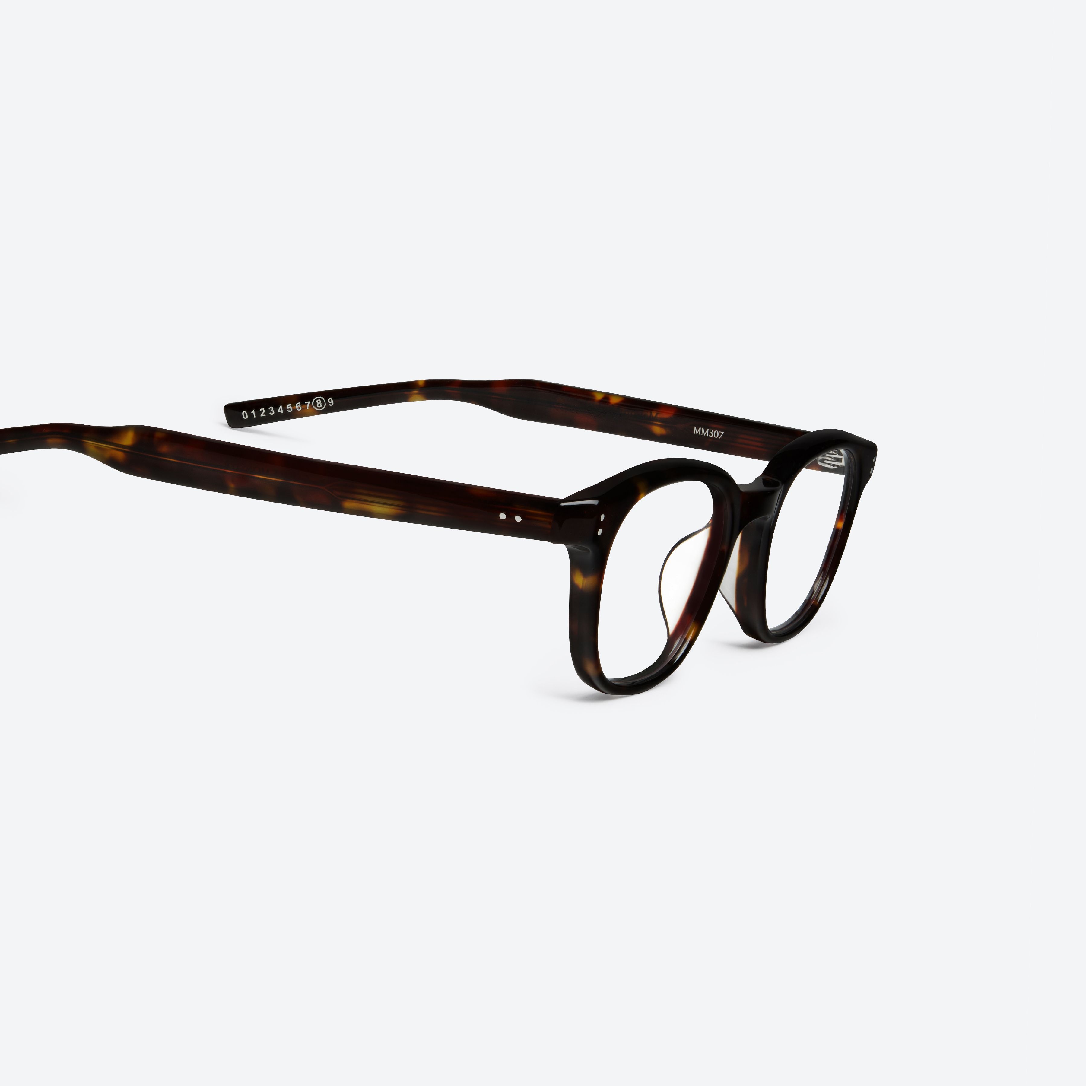 45-degree detailed view of Gentle Monster Maison Margiela - MM307 T1 Tortoise Acetate framed Square glasses.