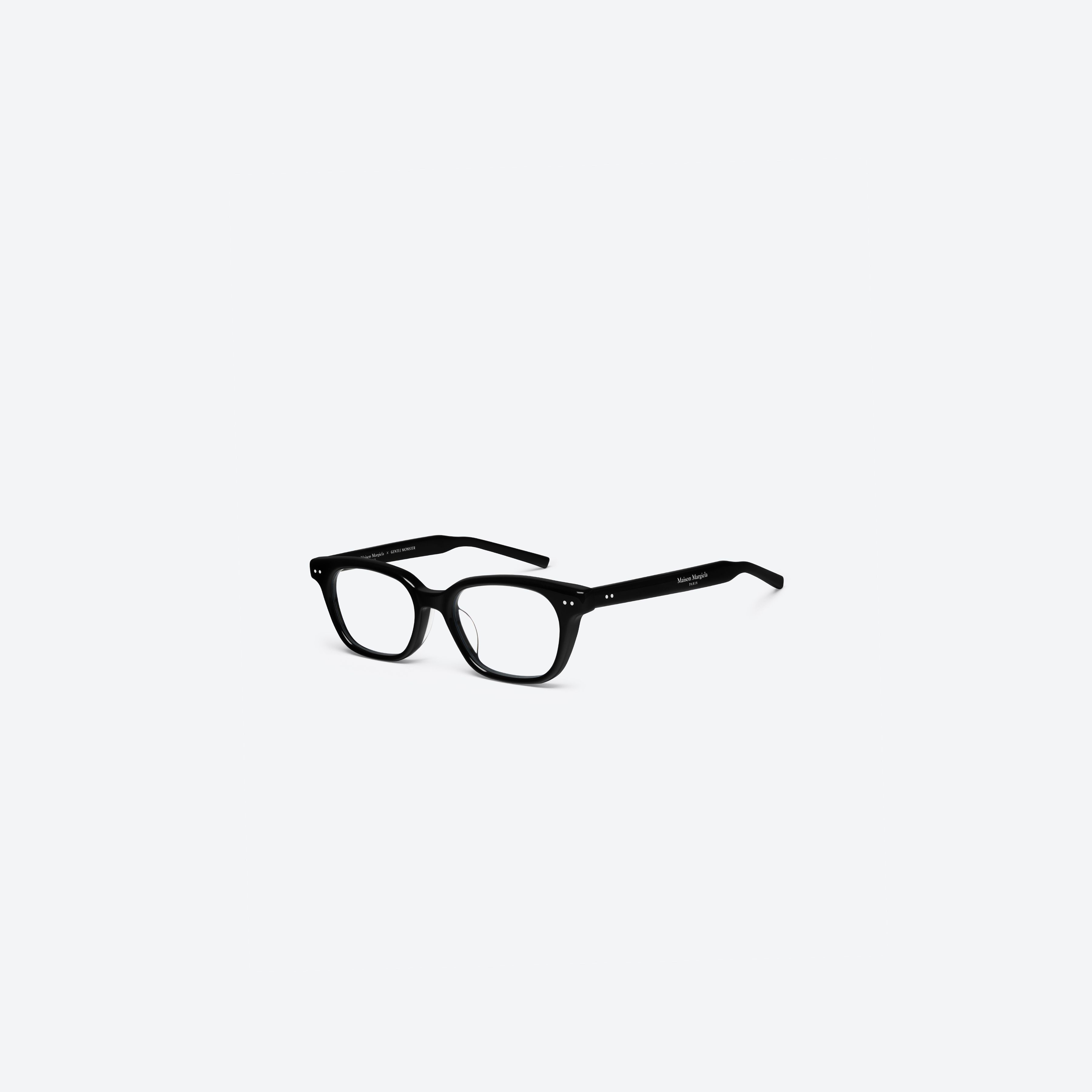 45-degree view of Gentle Monster Maison Margiela - MM308 01 Black Acetate framed Square glasses.