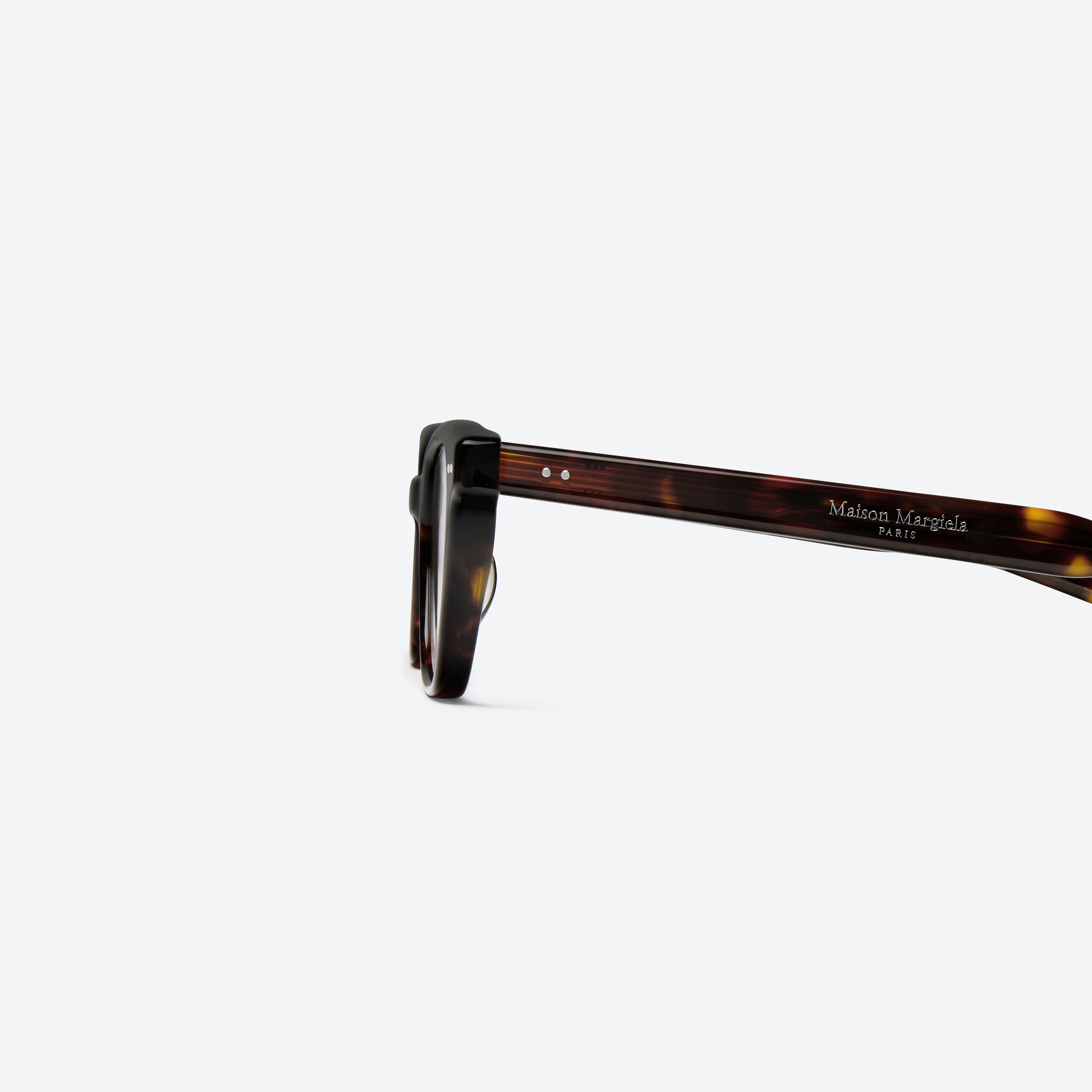 A detailed left view of Gentle Monster Maison Margiela - MM308 T1 Tortoise Acetate framed Square glasses.