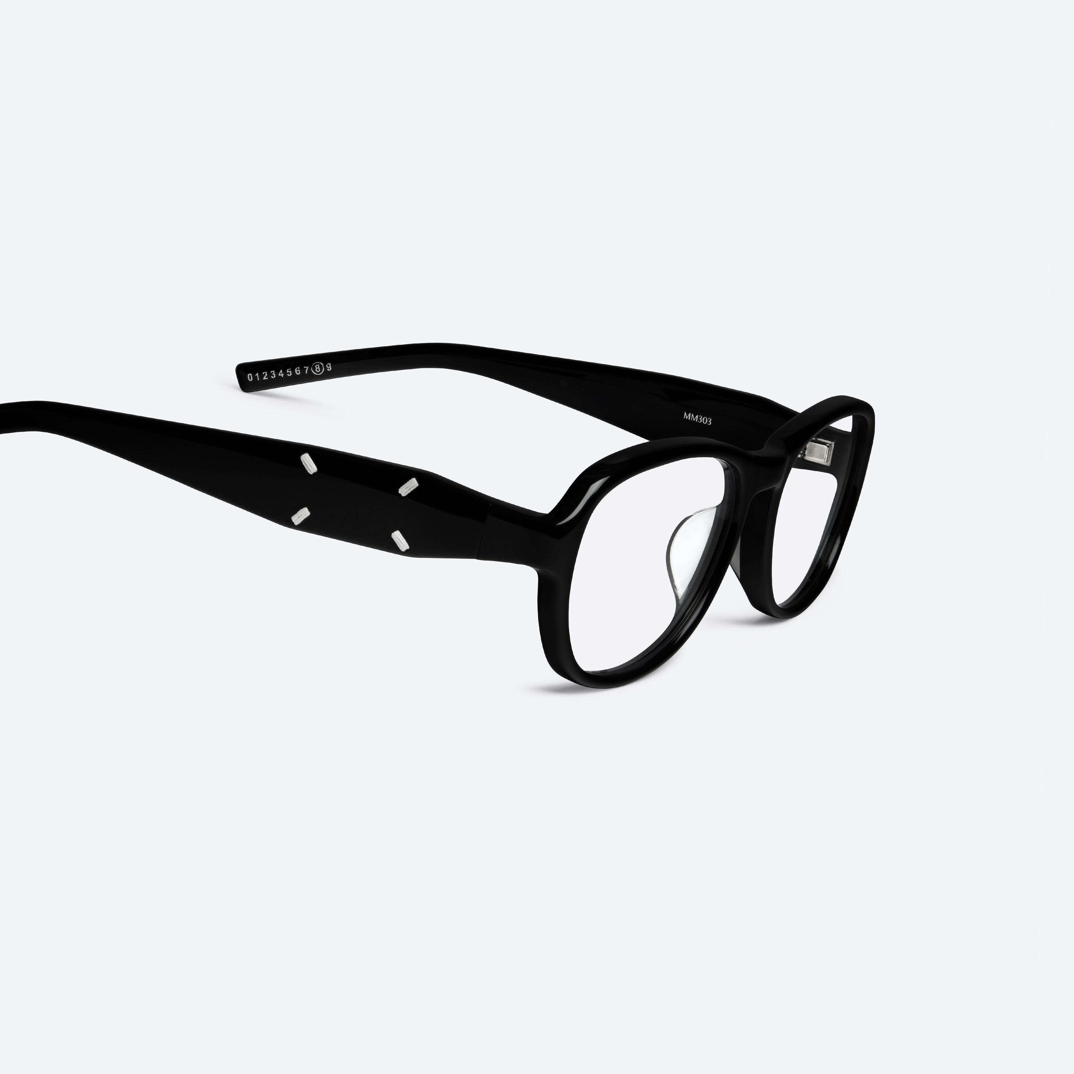 45-degree detailed view of Gentle Monster Maison Margiela - MM303 01 Black Acetate framed Aviator glasses.